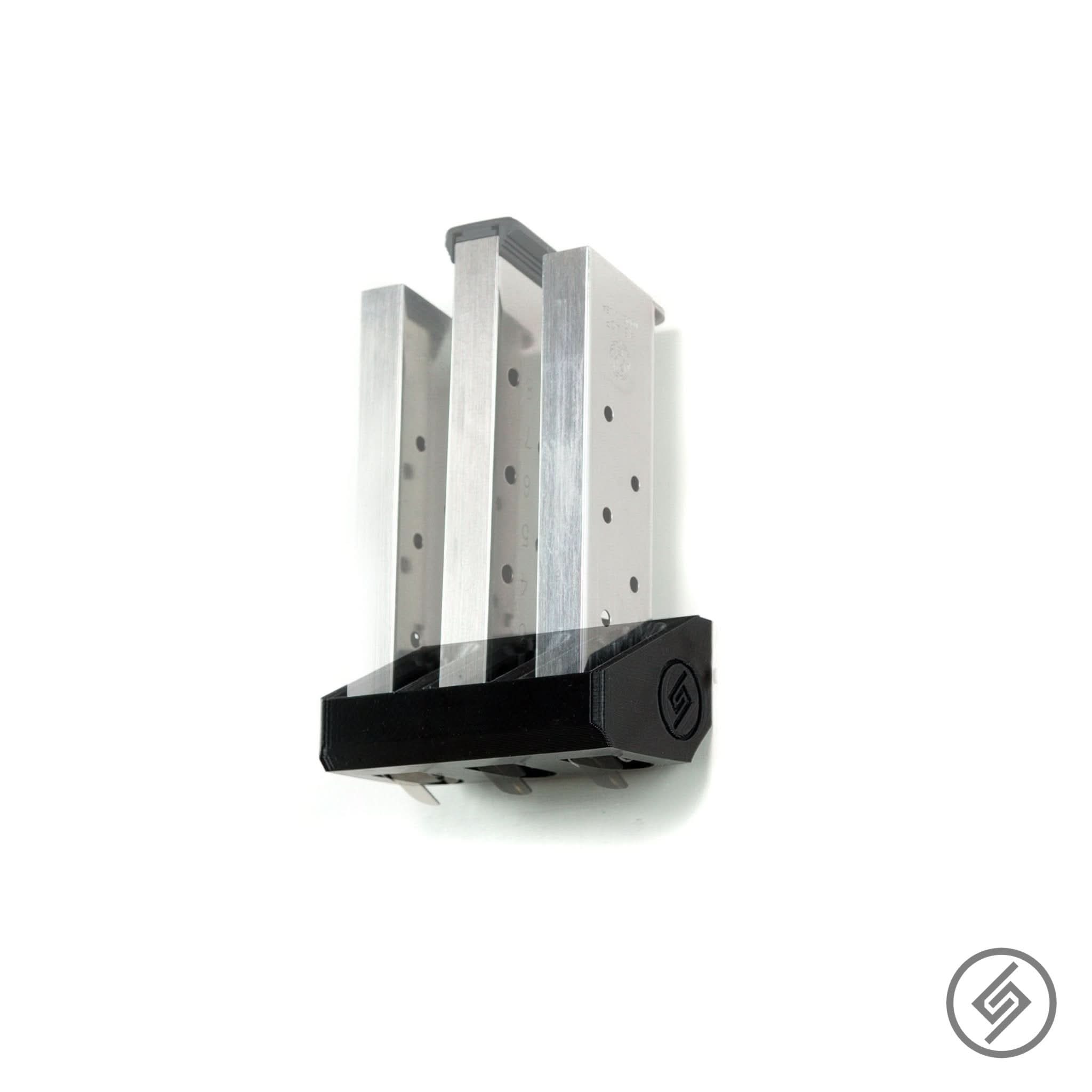 1911 magazines shown loaded in the Spartan Mounts wall rack for a clean, space-saving display