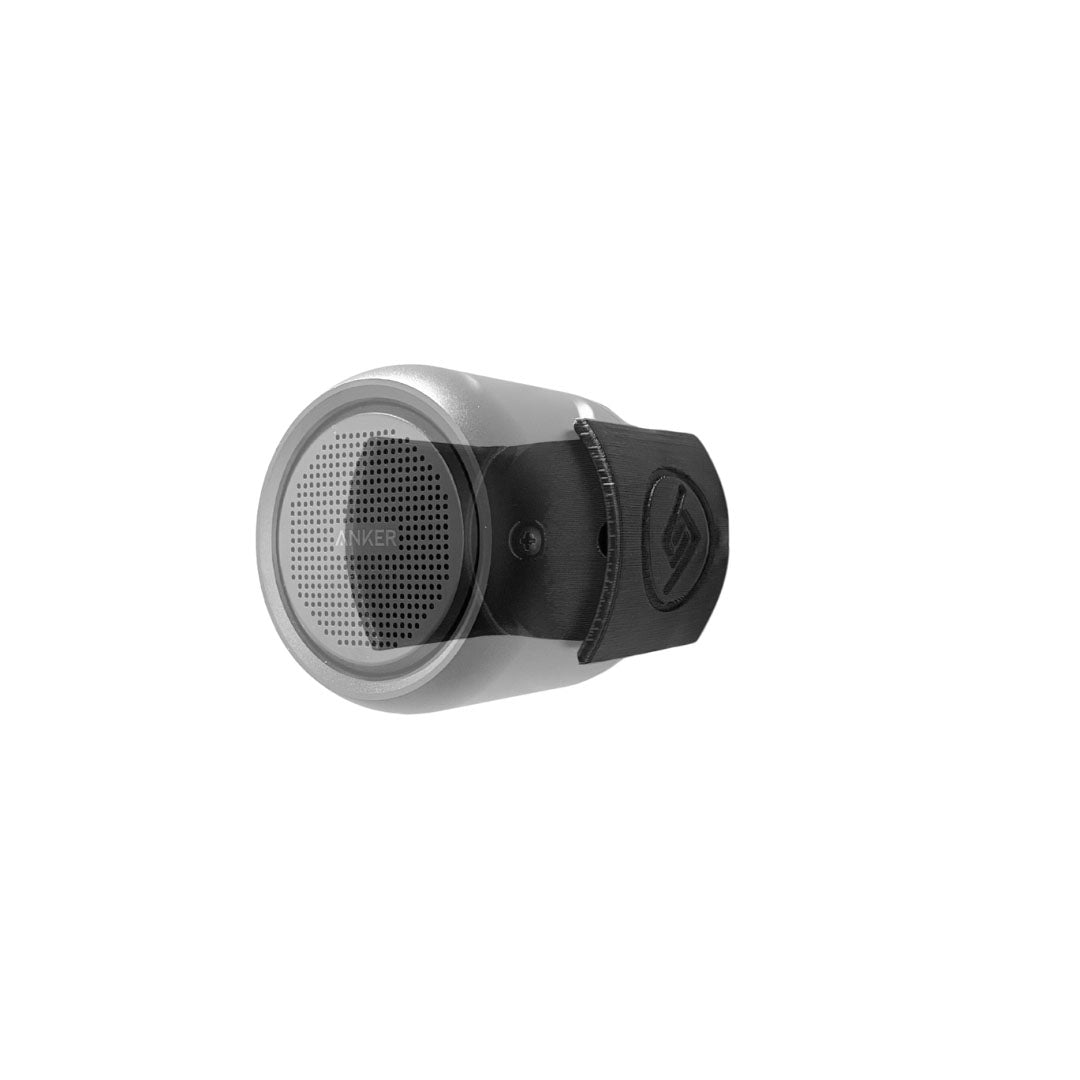 Anker Soundcore Mini speaker shown mounted on the Spartan Mounts wall mount for a clean, space-saving setup