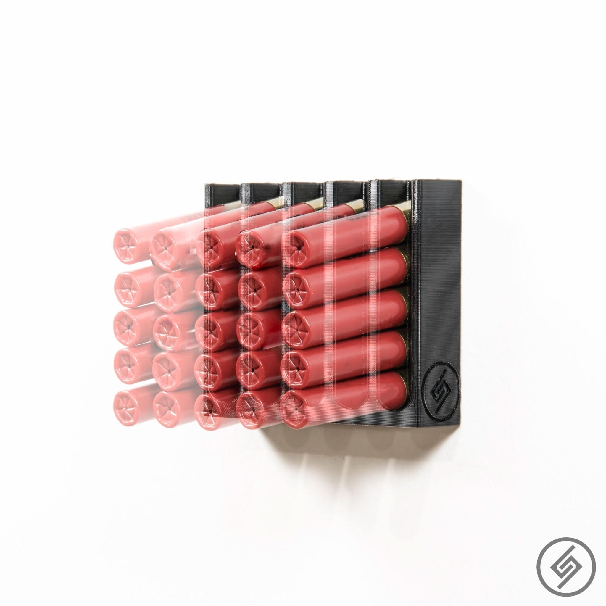 .410 bore shotgun shells shown loaded in the Spartan Mounts wall rack for organized, off-the-floor ammo storage