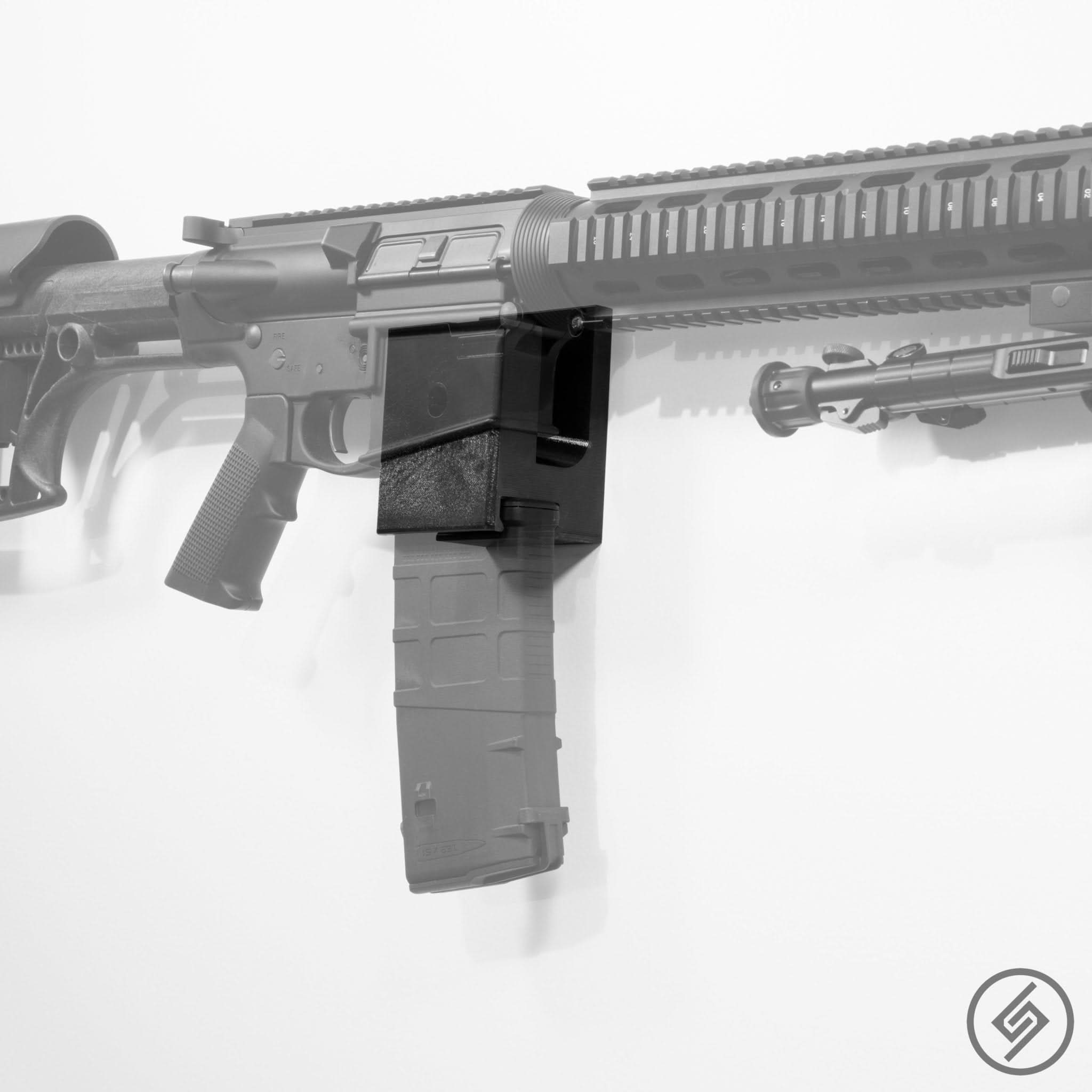 AR-10 rifle with a loaded PMAG shown mounted on the Spartan Mounts wall hook for quick-access storage