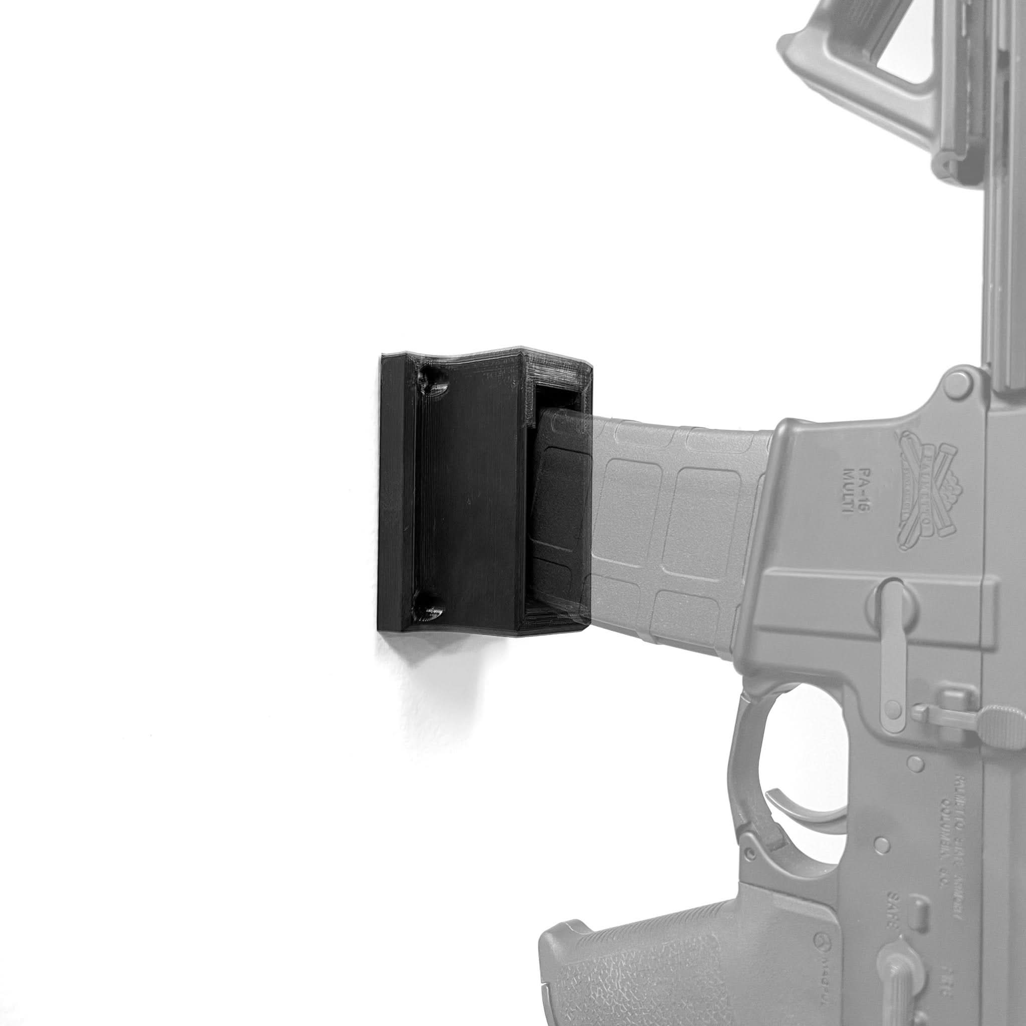 AR-15 rifle shown mounted on the Spartan Mounts Armory wall hook, PMAG Gen M2 compatible, for secure storage