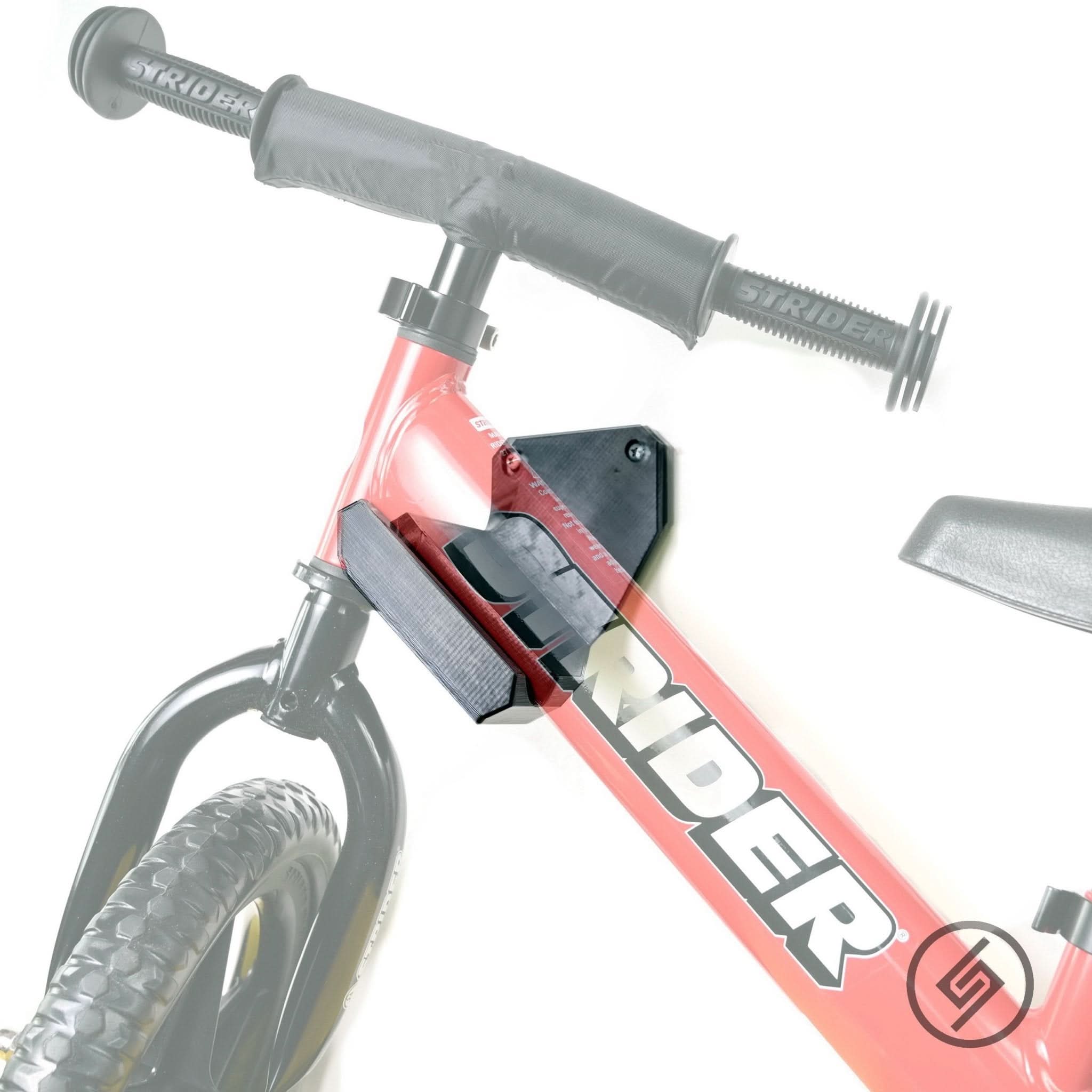 Kids balance bike shown hung on the Spartan Mounts wall hook for organized, off-the-floor storage
