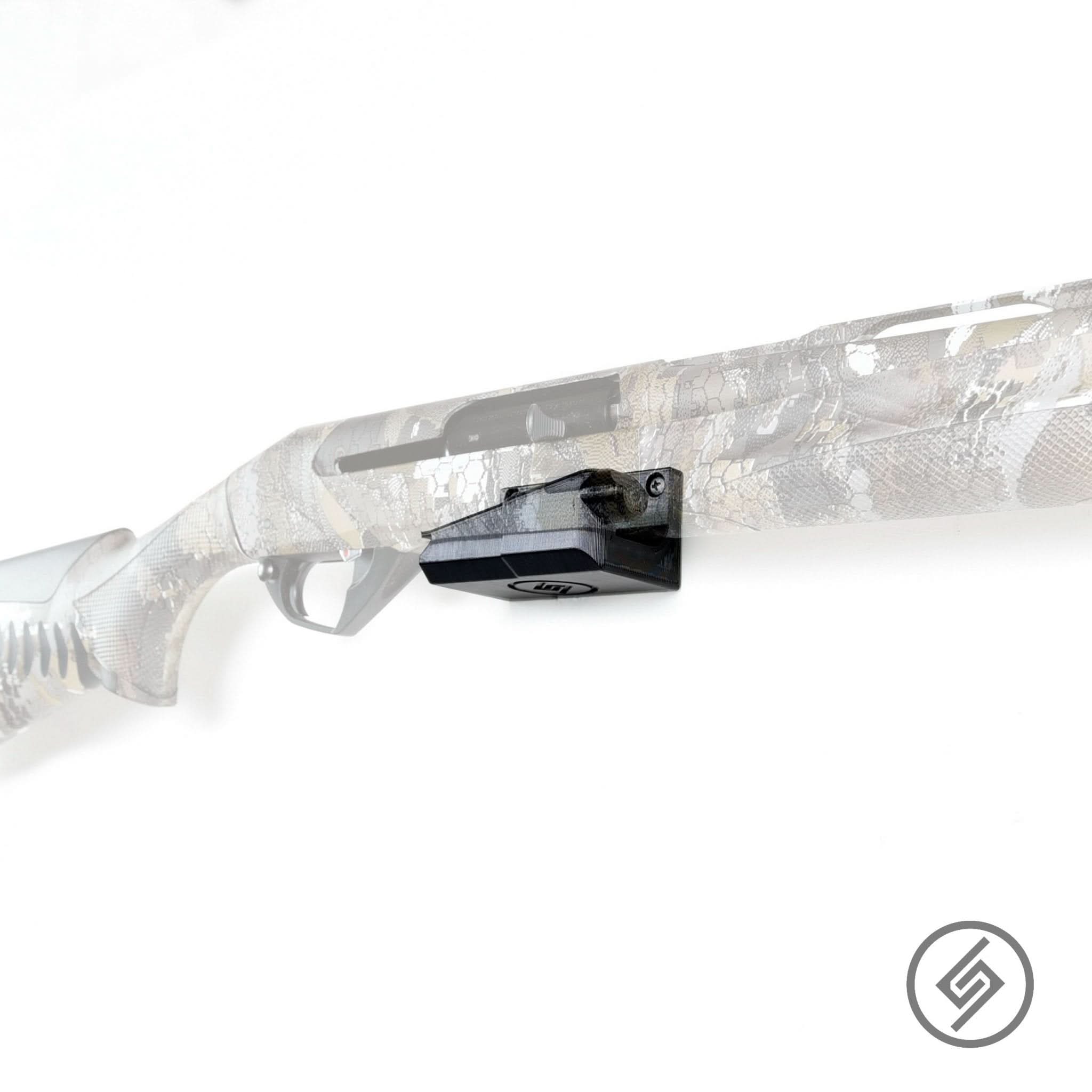 Benelli Super Black Eagle shotgun shown mounted on the Spartan Mounts wall hook for secure, quick-access storage