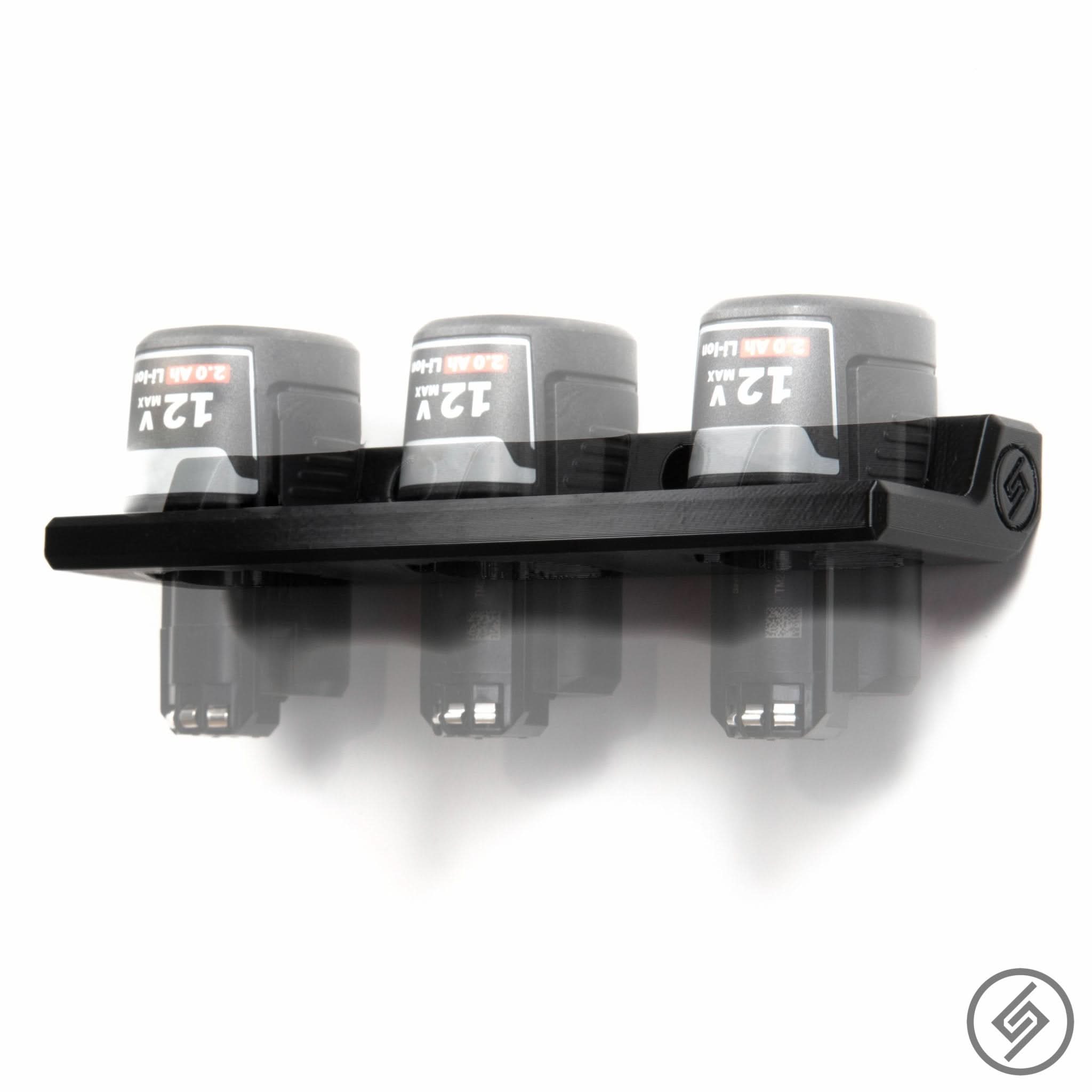 Bosch 12V battery shown mounted on the Spartan Mounts wall hook for organized garage and shop storage
