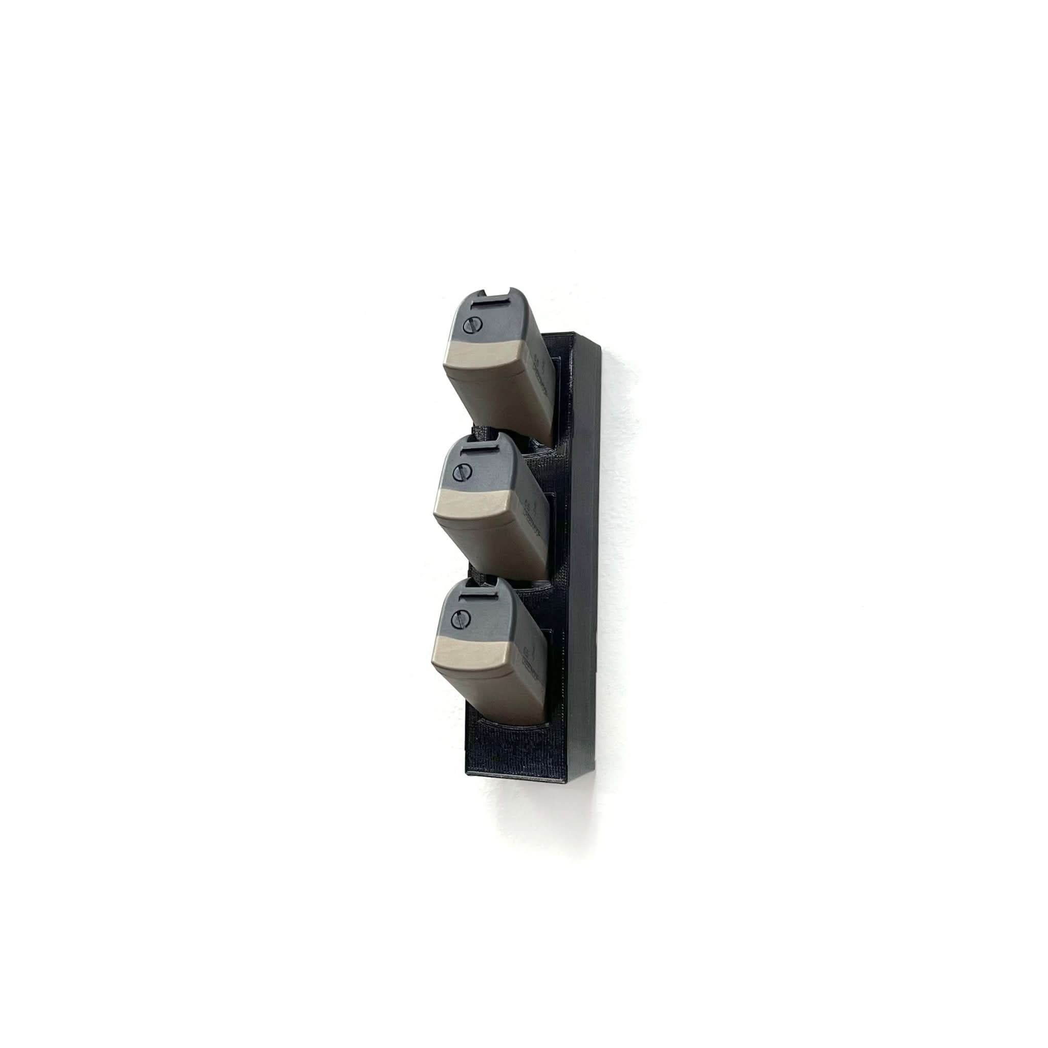 Browning X-Bolt short-action magazines shown loaded in the Spartan Mounts wall rack for organized, off-the-floor storage