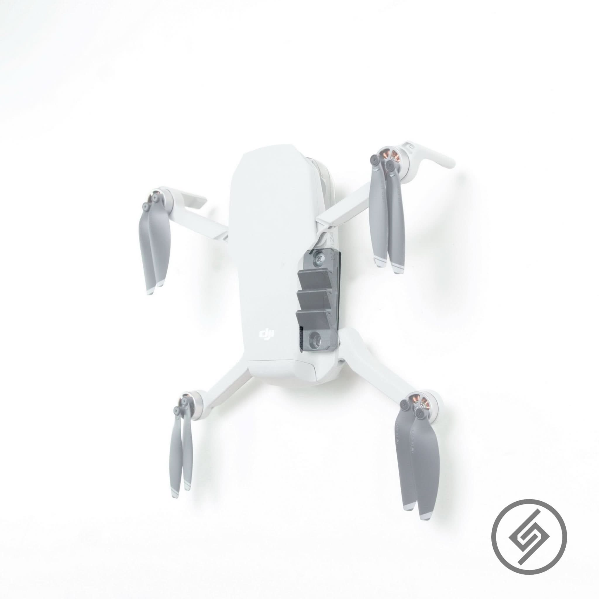 DJI drone shown mounted on the Spartan Mounts wall mount for organized, off-the-floor storage