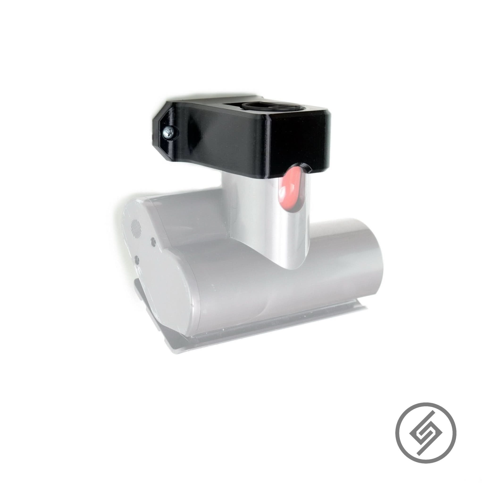 Dyson stick vacuum accessories shown mounted on the Spartan Mounts wall mount for organized, off-the-floor storage