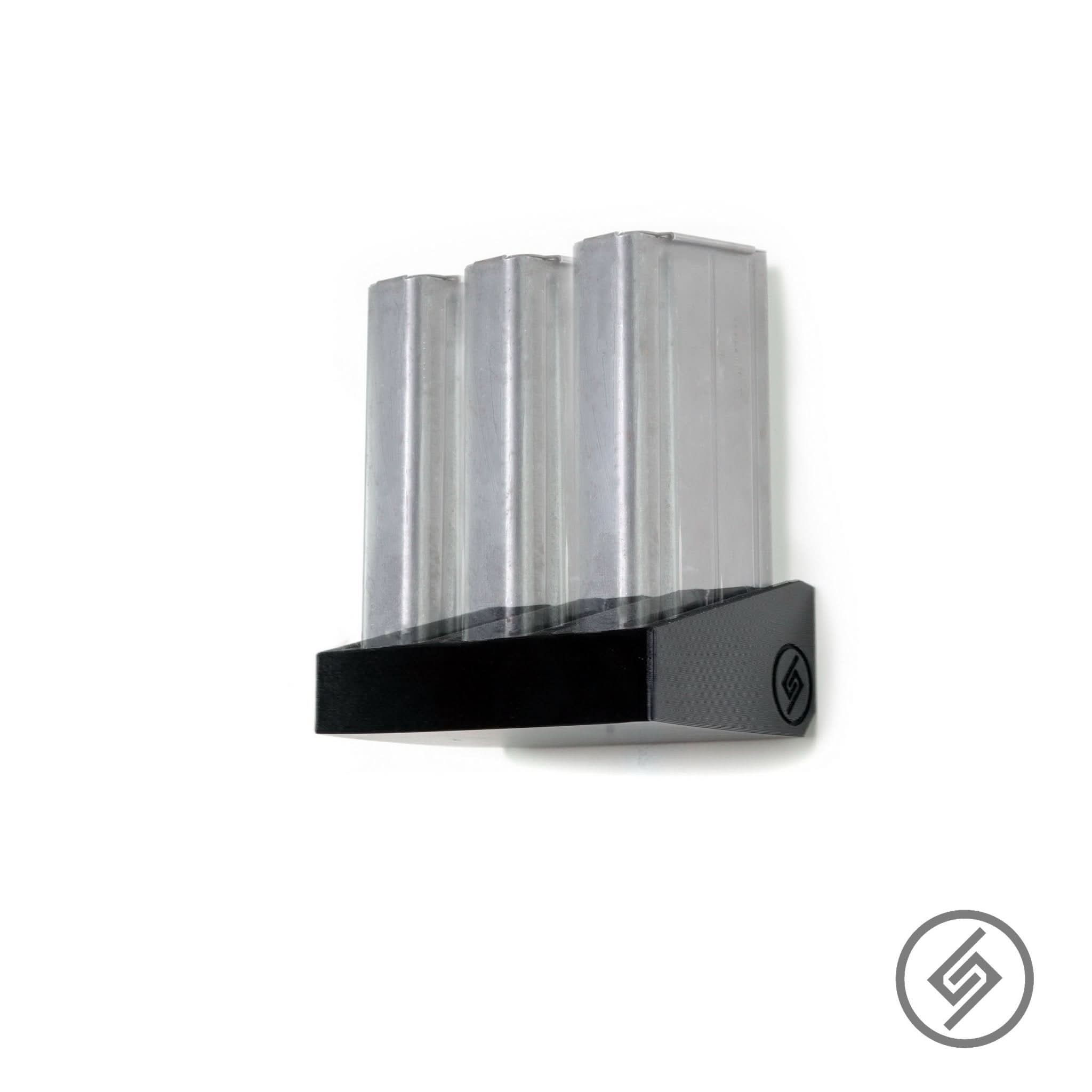 FAL magazines shown loaded in the Spartan Mounts wall rack for organized, off-the-floor storage
