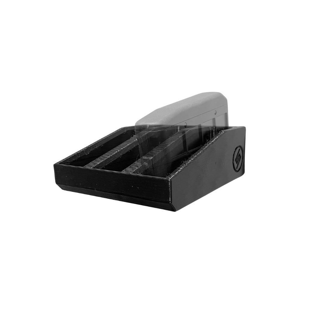 Tikka T3X short-action .308/6.5 magazines shown loaded in the Spartan Mounts wall rack for organized, off-the-floor storage