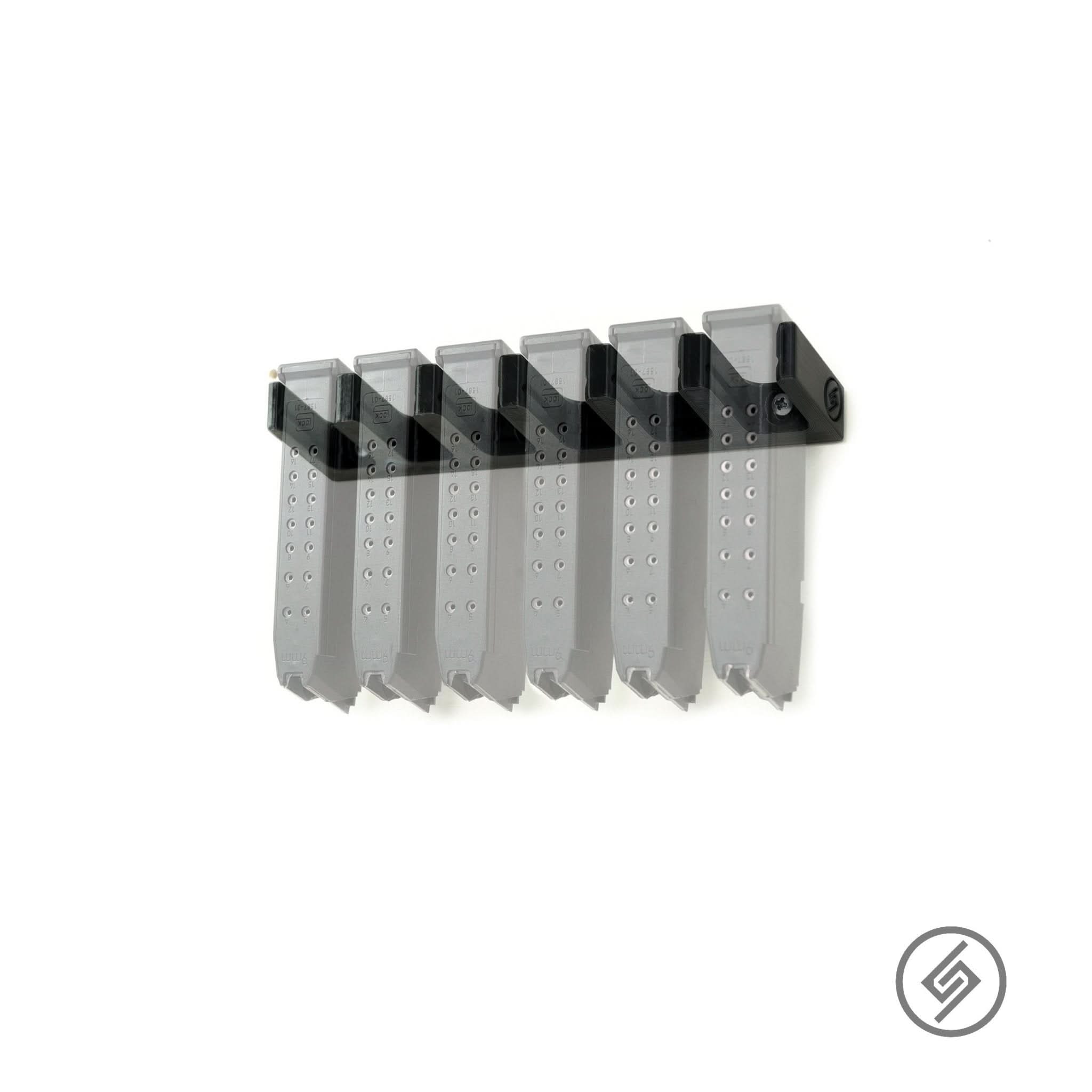 Six Glock magazines shown loaded in the Spartan Mounts wall rack for organized, off-the-floor storage