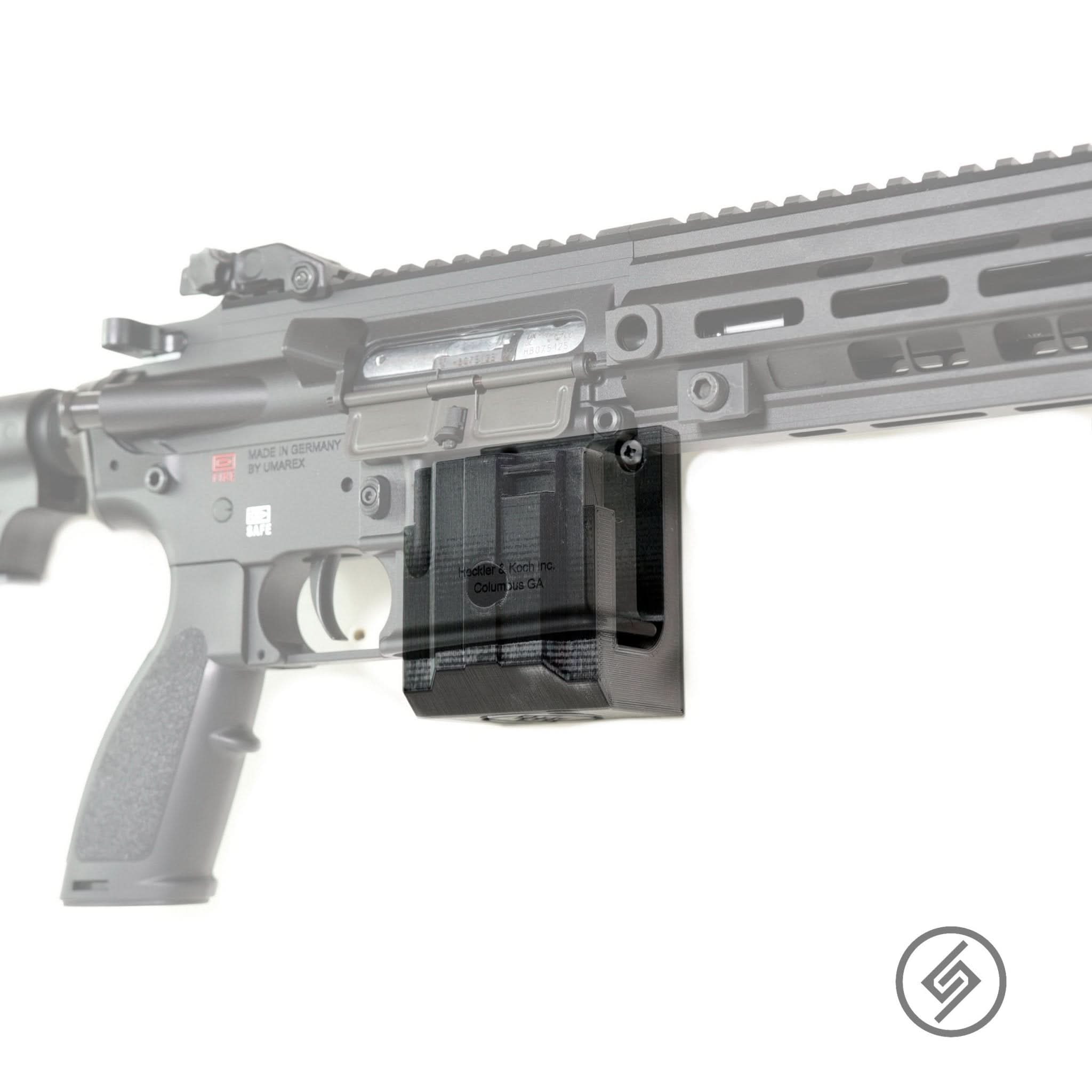 H&K 416 .22 rifle shown mounted on the Spartan Mounts wall hook for secure, quick-access storage