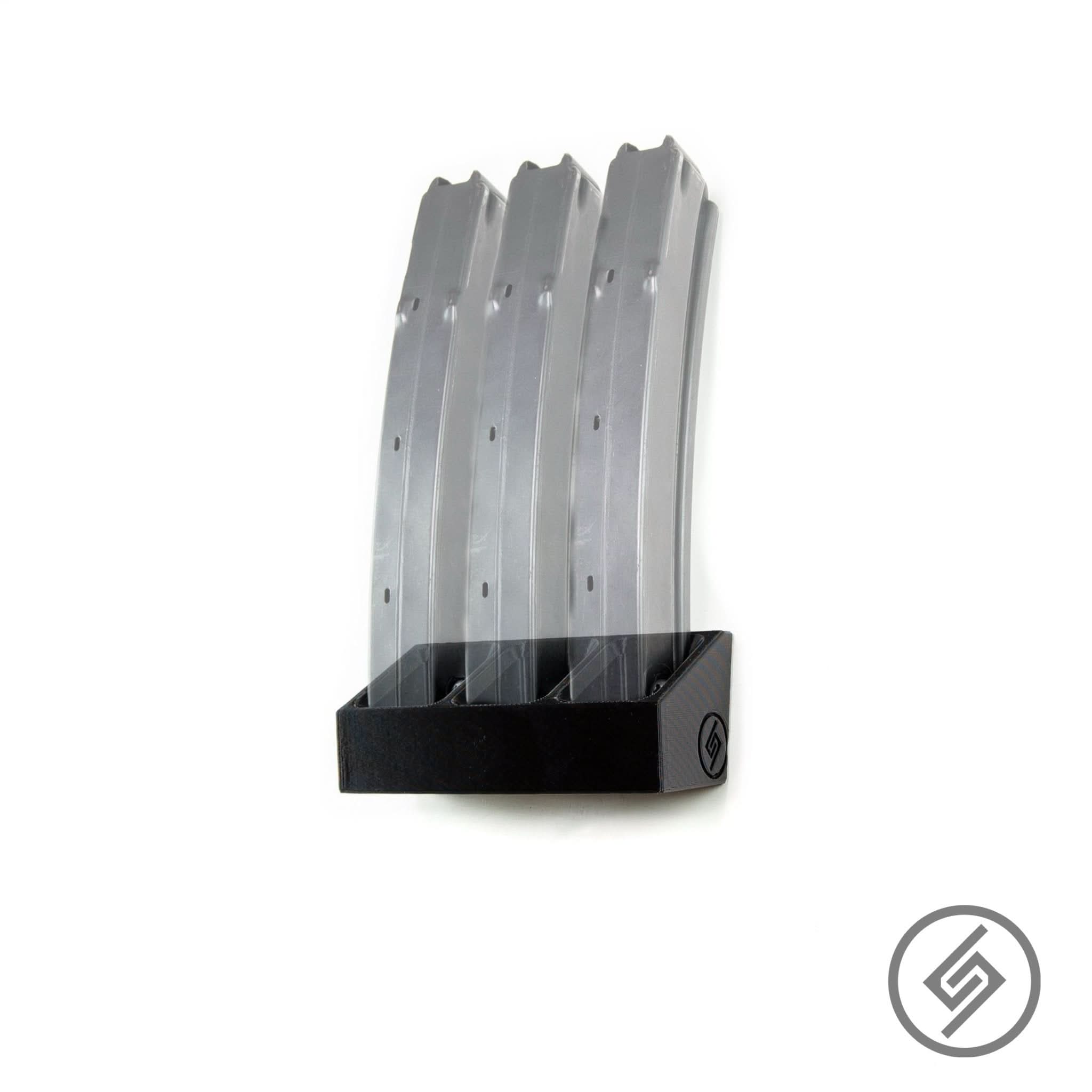 H&K MP5 magazines shown loaded in the Spartan Mounts wall rack for organized, off-the-floor storage