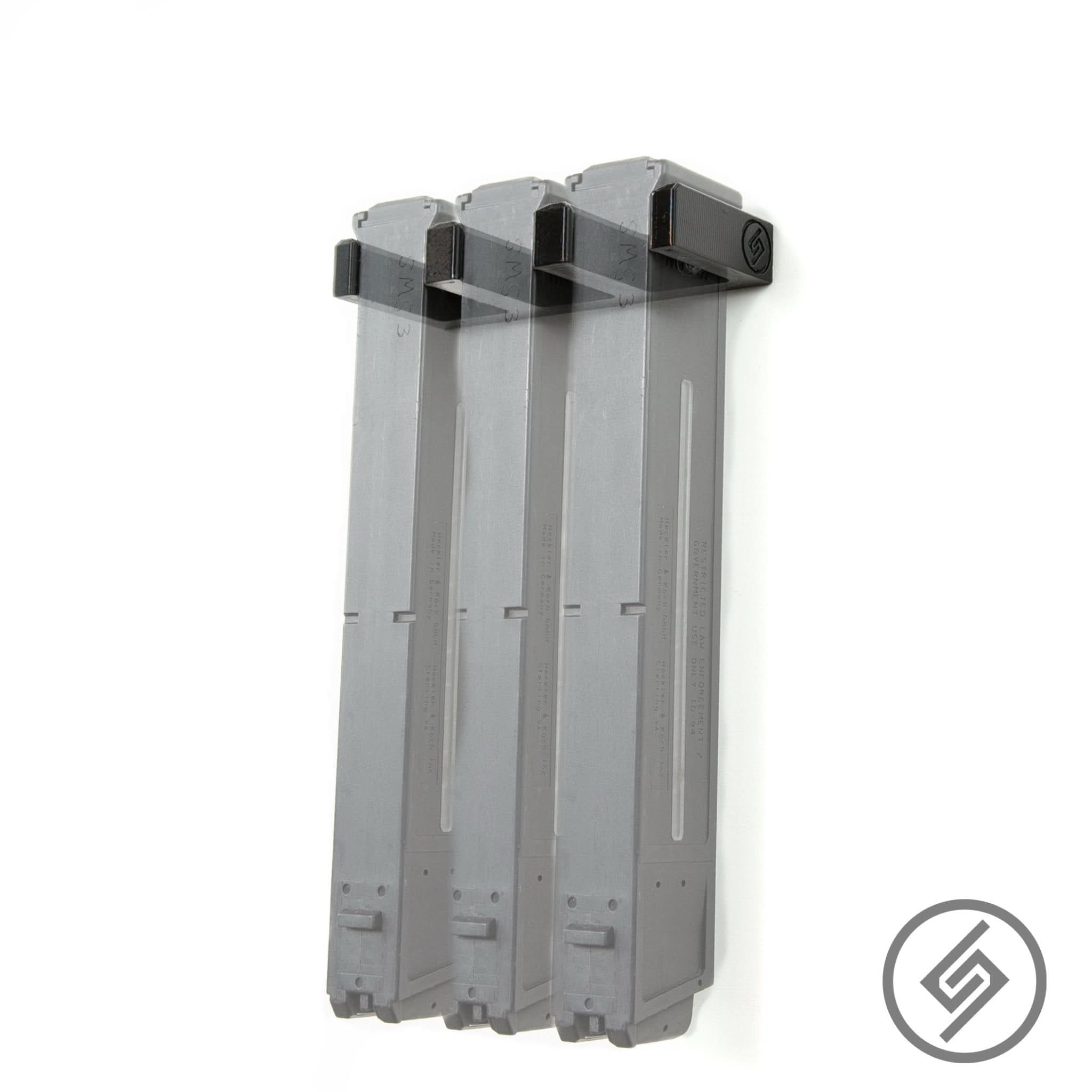 H&K UMP .40/.45 magazines shown loaded in the Spartan Mounts wall rack for organized, off-the-floor storage