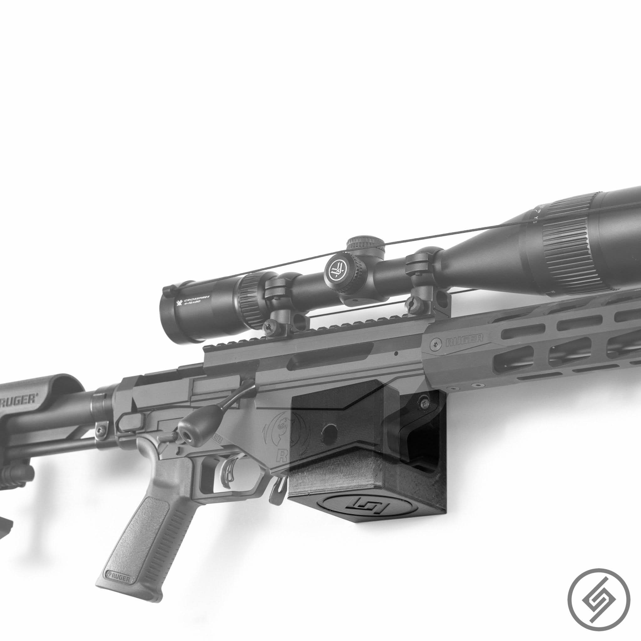 HOWA APC rifle shown mounted on the Spartan Mounts wall hook for secure, quick-access storage