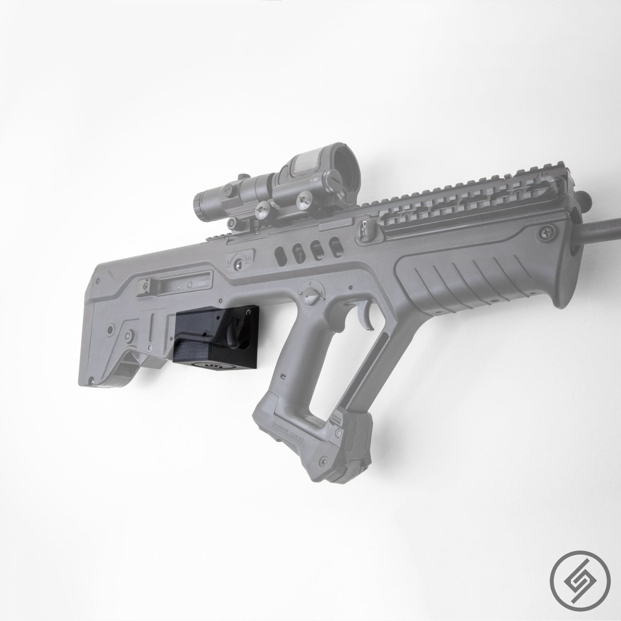 IWI Tavor X95/SAR rifle shown mounted on the Spartan Mounts wall hook for secure gun room storage