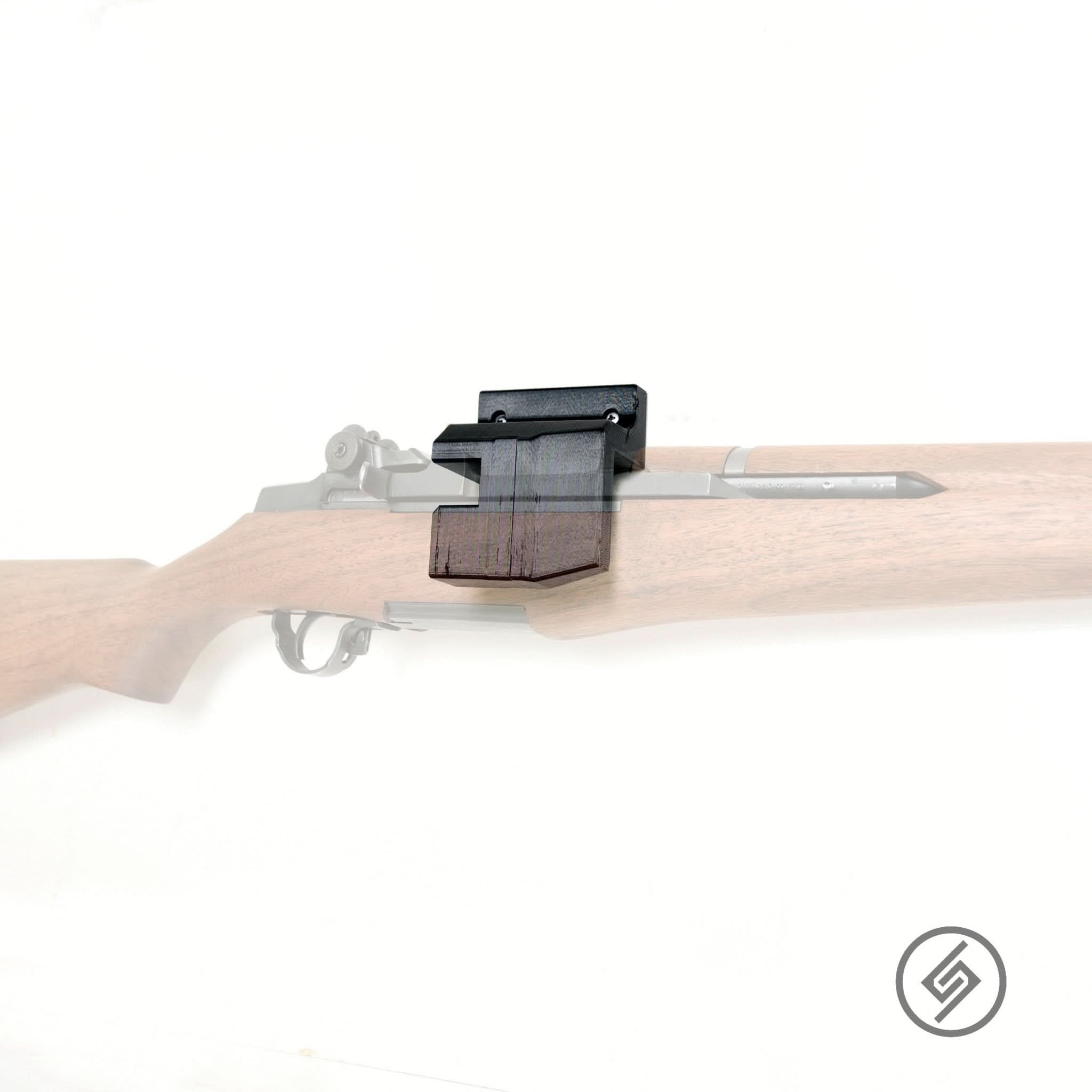 M1 Garand rifle shown mounted on the Spartan Mounts wall hook for secure, quick-access storage