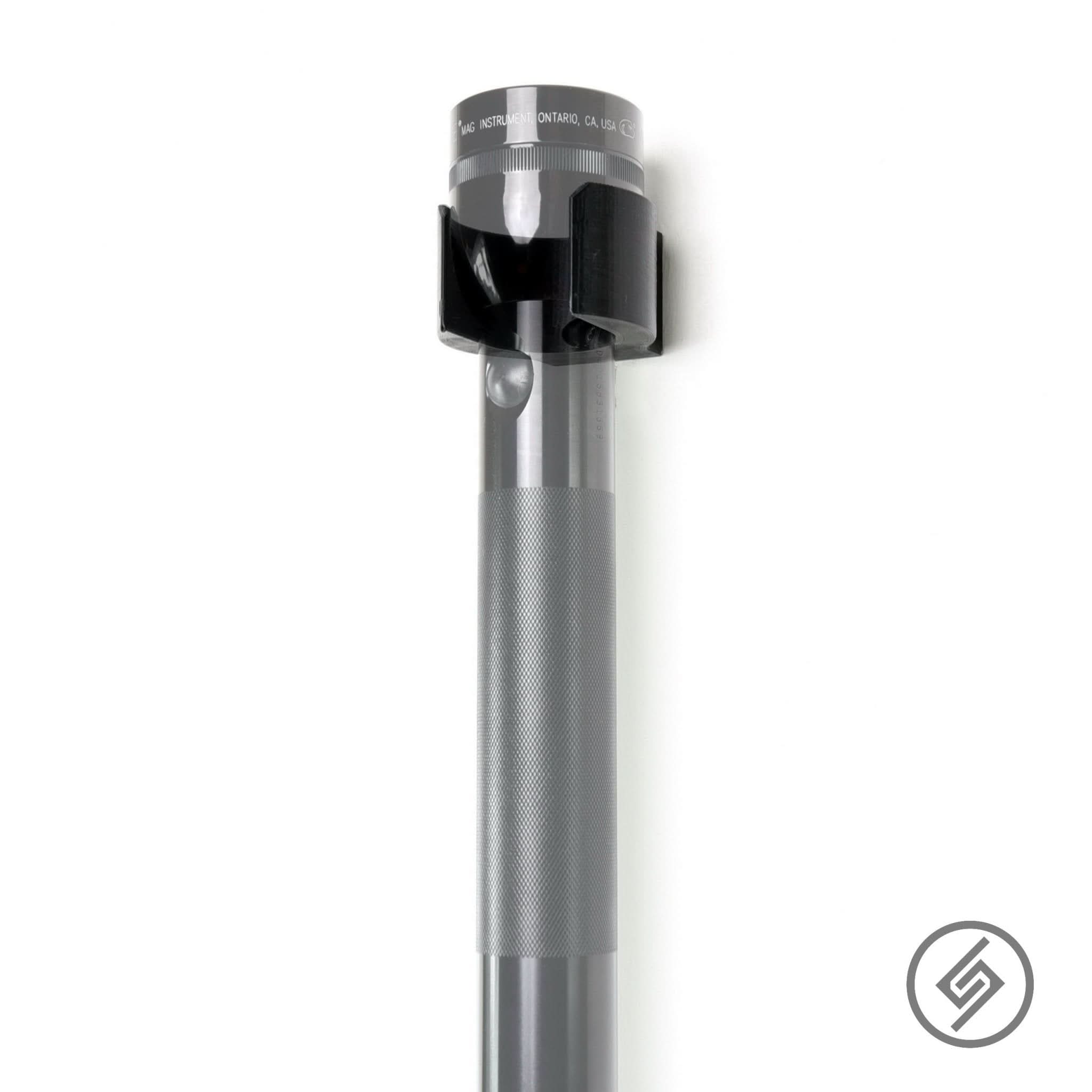 MagLite flashlight shown mounted on the Spartan Mounts wall hook for quick-access, off-the-floor storage