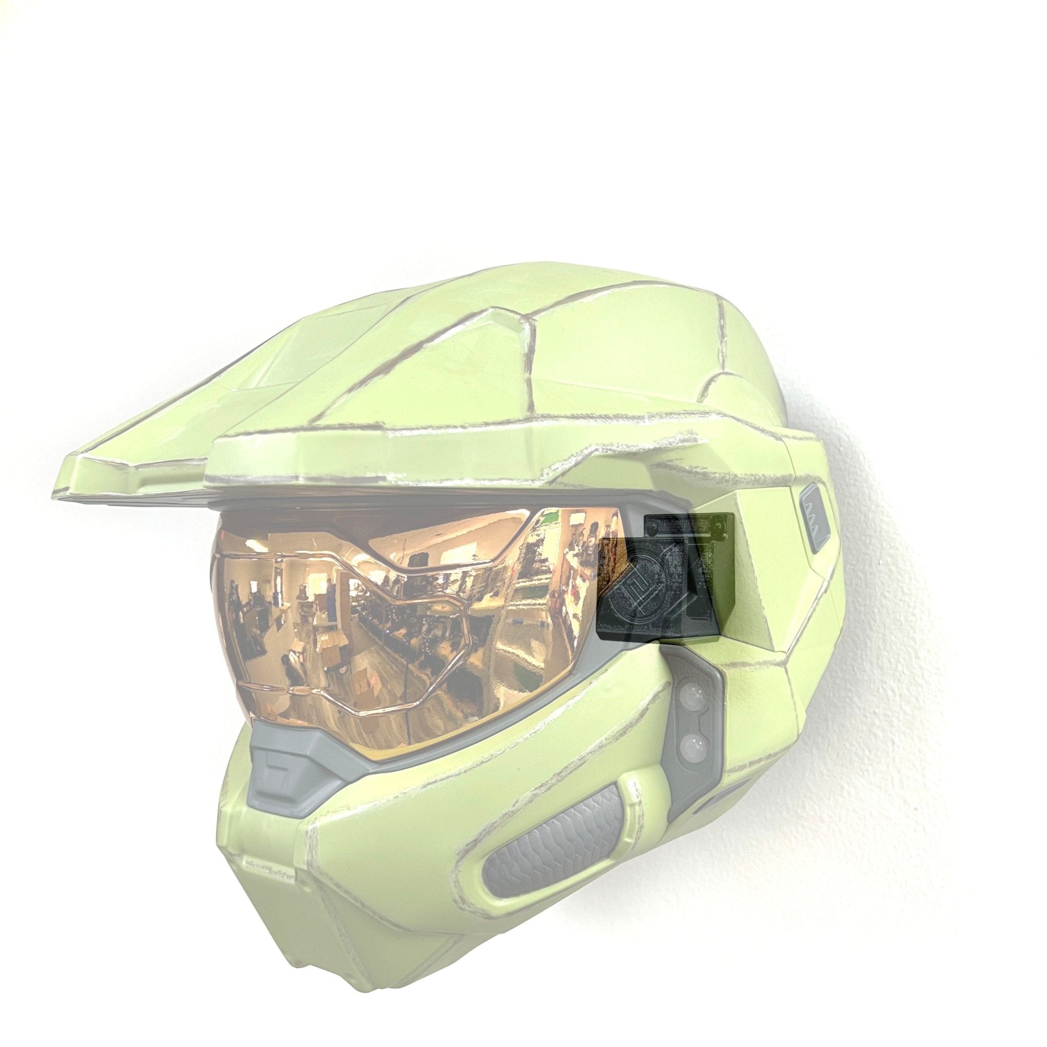 Master Chief Halo helmet shown mounted on the Spartan Mounts wall mount for a clean, off-the-floor display