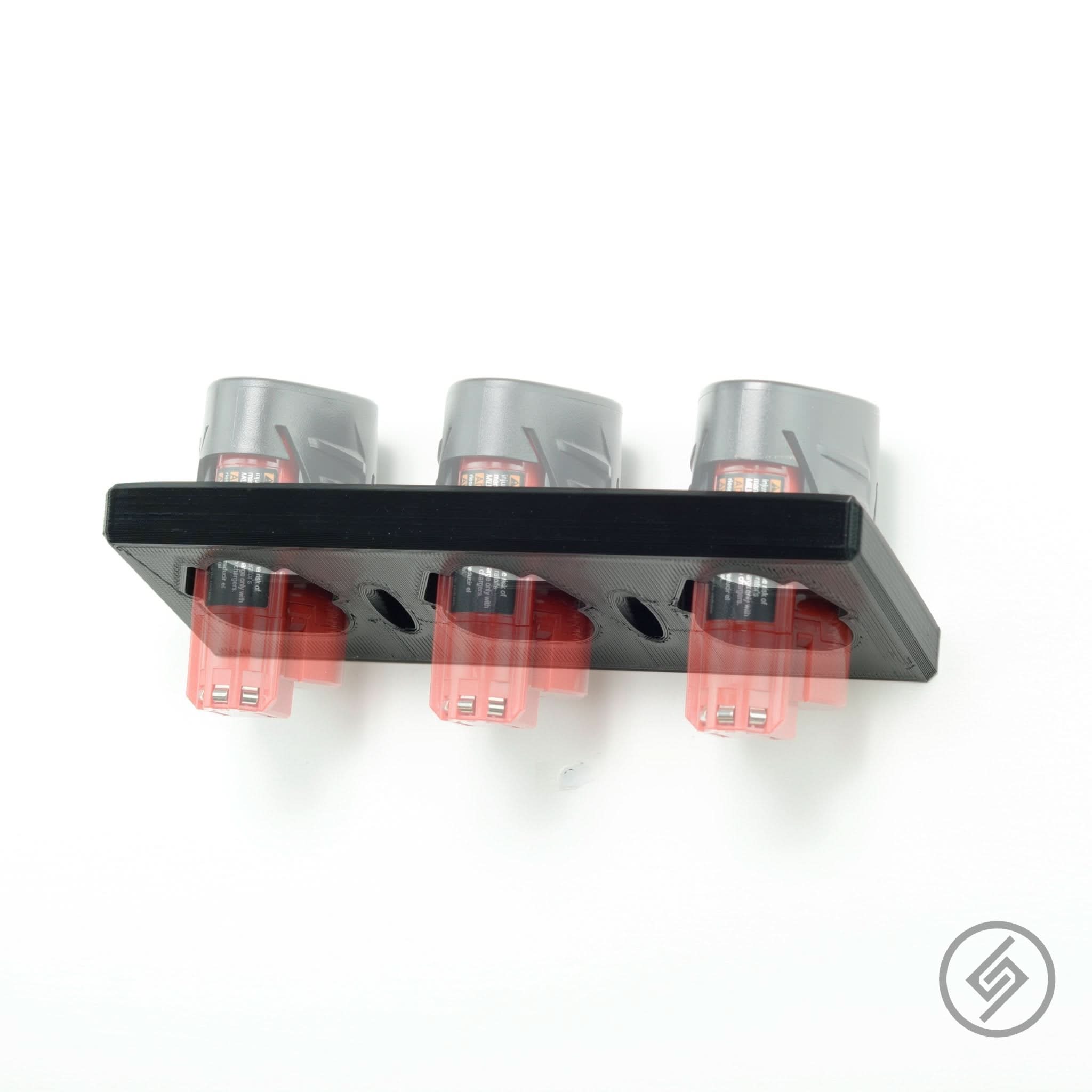 Milwaukee M12 battery shown mounted on the Spartan Mounts wall hook for organized garage and shop storage