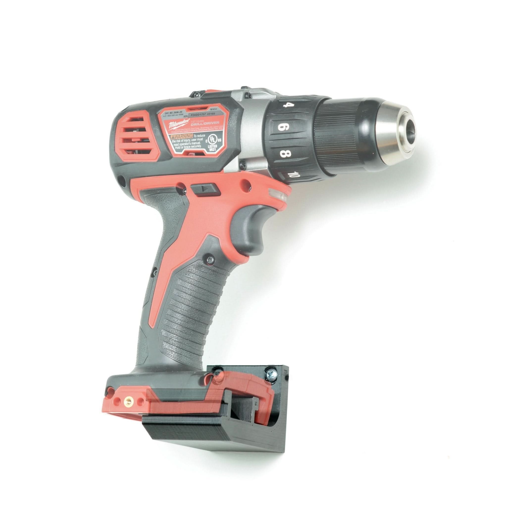 Milwaukee M18 power tool shown mounted on the Spartan Mounts wall hook for organized garage and shop storage