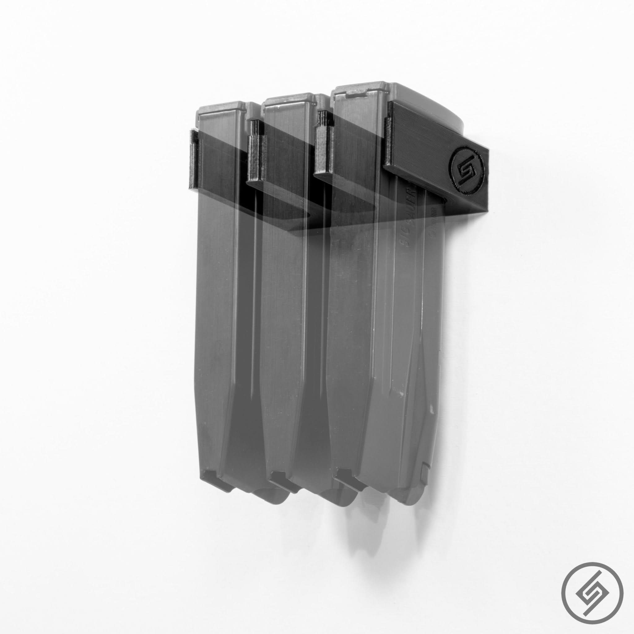 M&P 9 and .40 magazines shown loaded in the Spartan Mounts wall rack for organized, off-the-floor storage