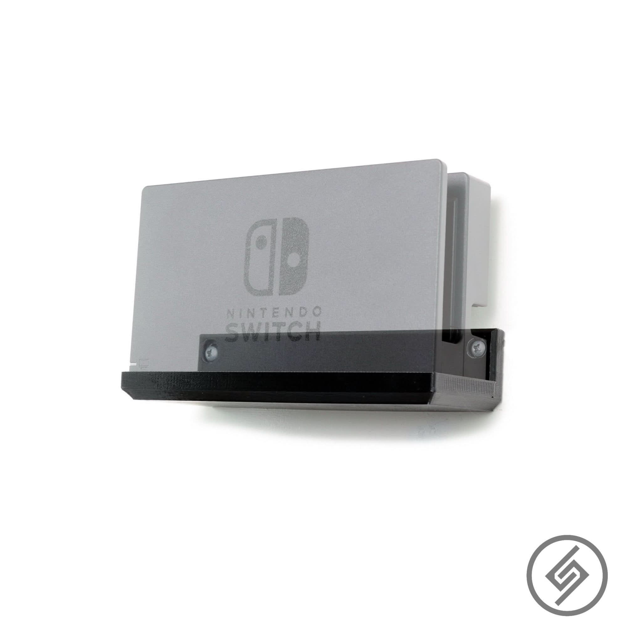Nintendo Switch dock shown mounted on the Spartan Mounts wall mount for a clean, space-saving setup