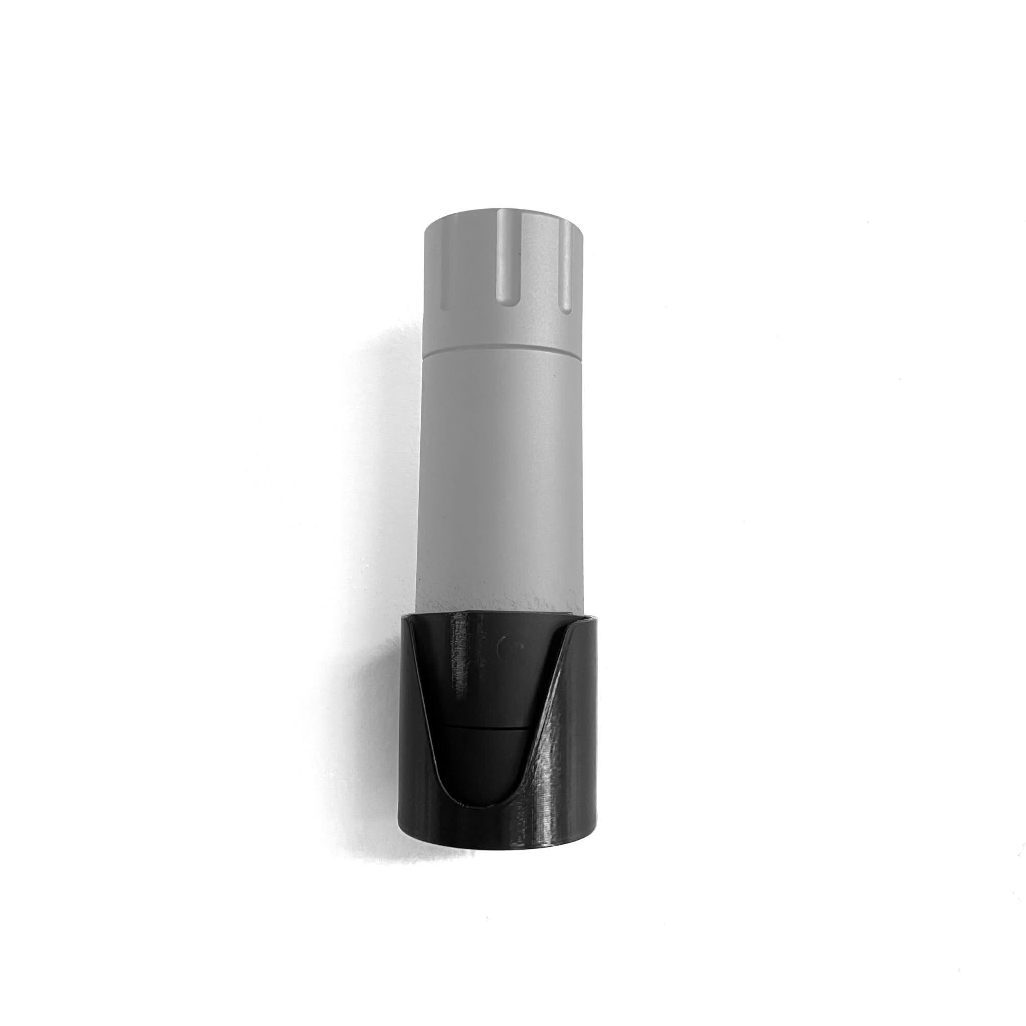 Pepper Cannon grinder shown held on the Spartan Mounts magnetic grill and smoker mount for easy reach while cooking