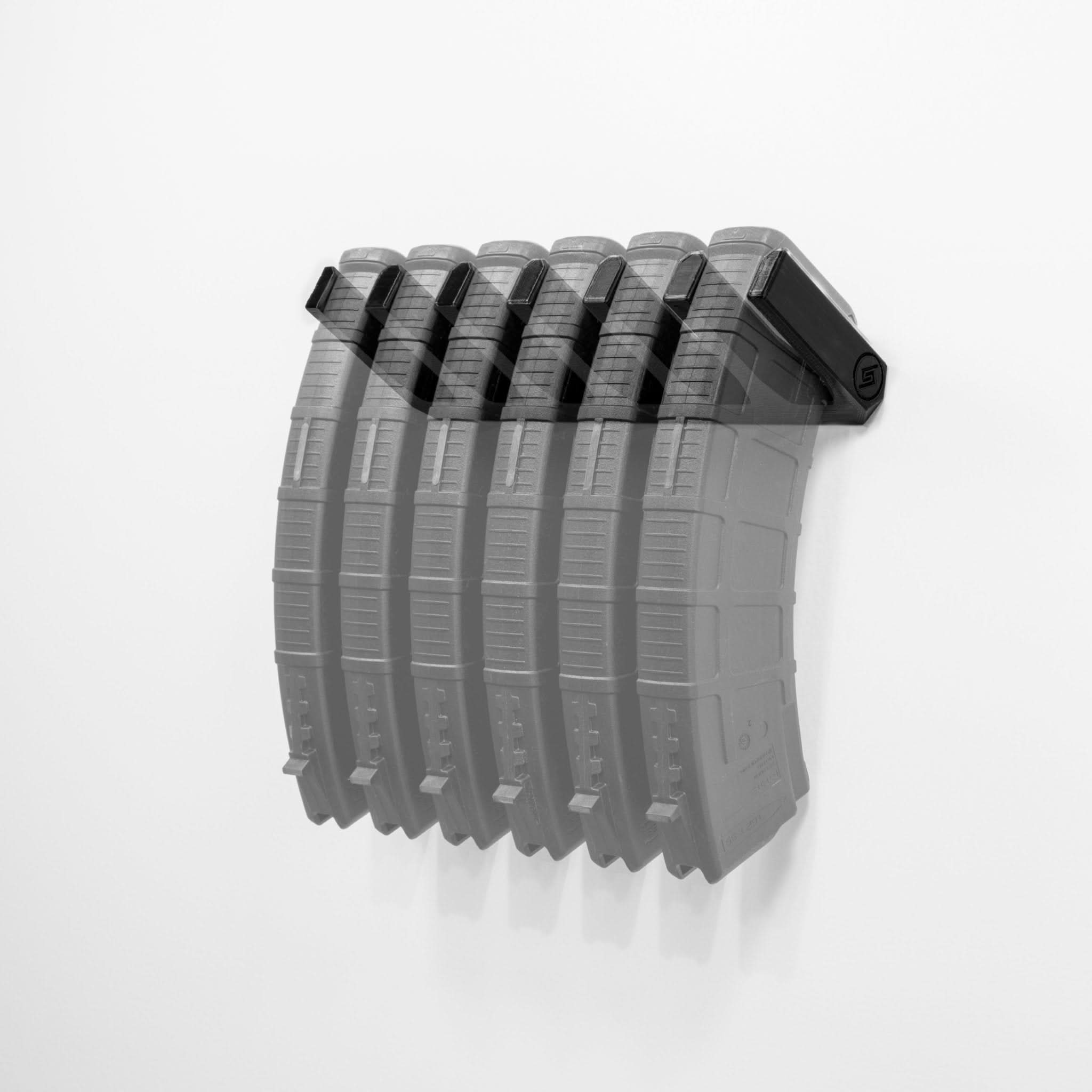 Six AK-47 PMAG magazines shown loaded in the Spartan Mounts wall rack for organized, off-the-floor storage