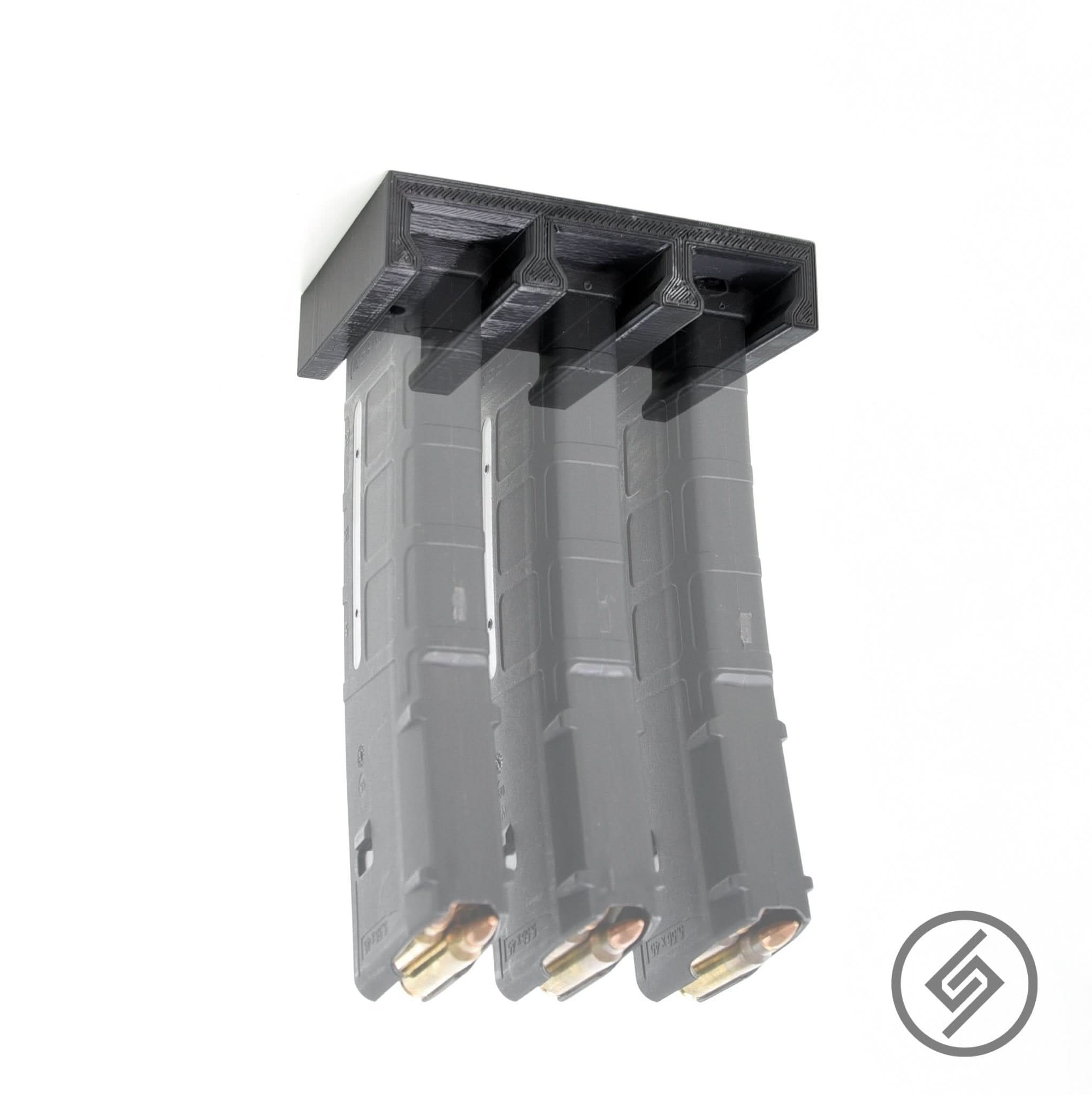 Three AR-15 PMAG magazines shown top-loaded in the Spartan Mounts wall rack for a clean, space-saving display