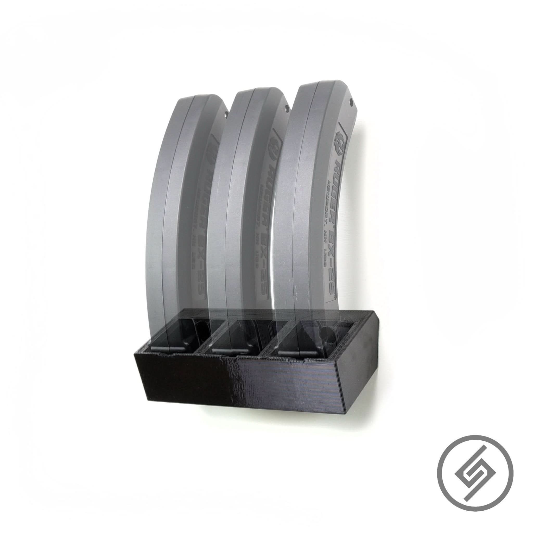 Ruger BX magazines shown loaded in the Spartan Mounts wall rack for a clean, space-saving display