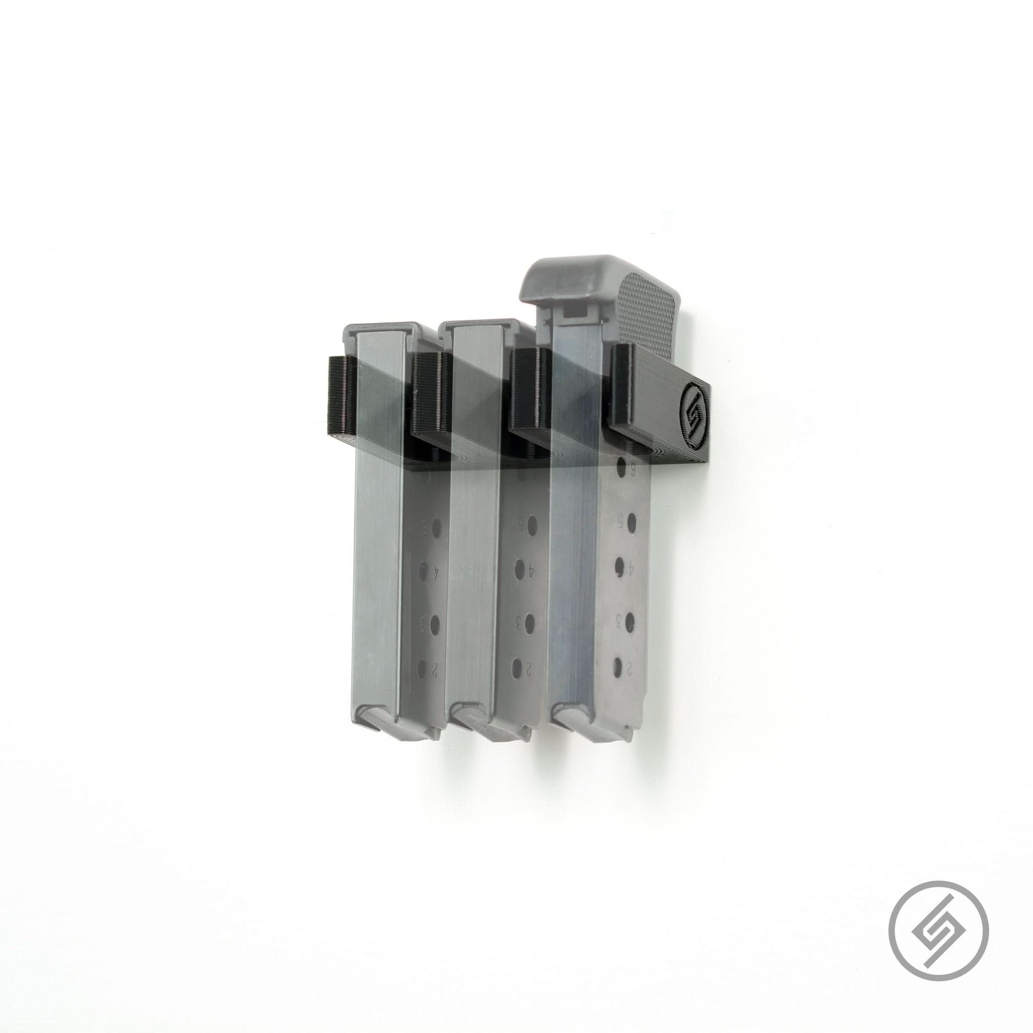 Ruger LCP MAX magazines shown loaded in the Spartan Mounts wall rack for organized, off-the-floor storage