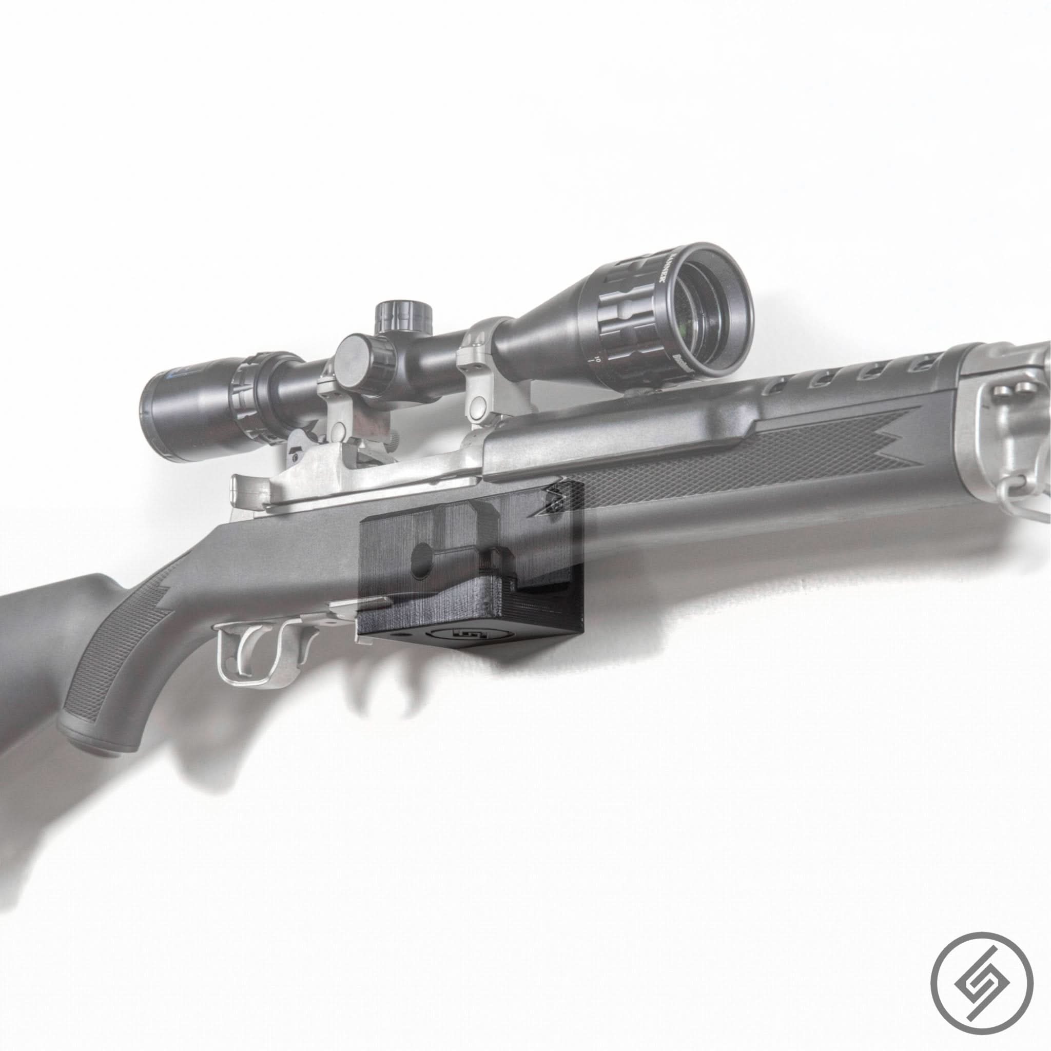 Ruger Mini-14/30 rifle shown mounted on the Spartan Mounts wall hook for secure, quick-access storage