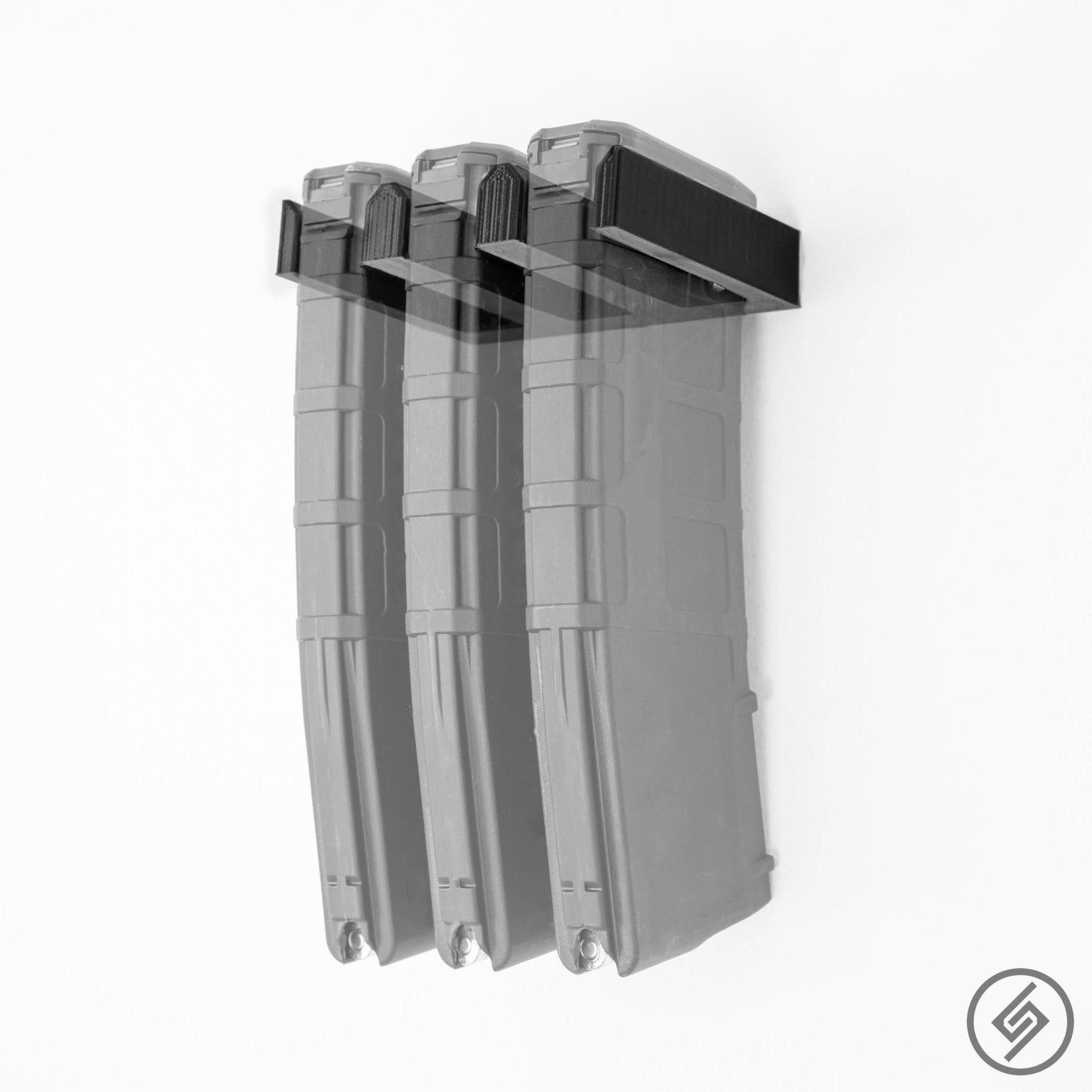 Ruger Mini-14 magazines shown loaded in the Spartan Mounts wall rack for organized, off-the-floor storage