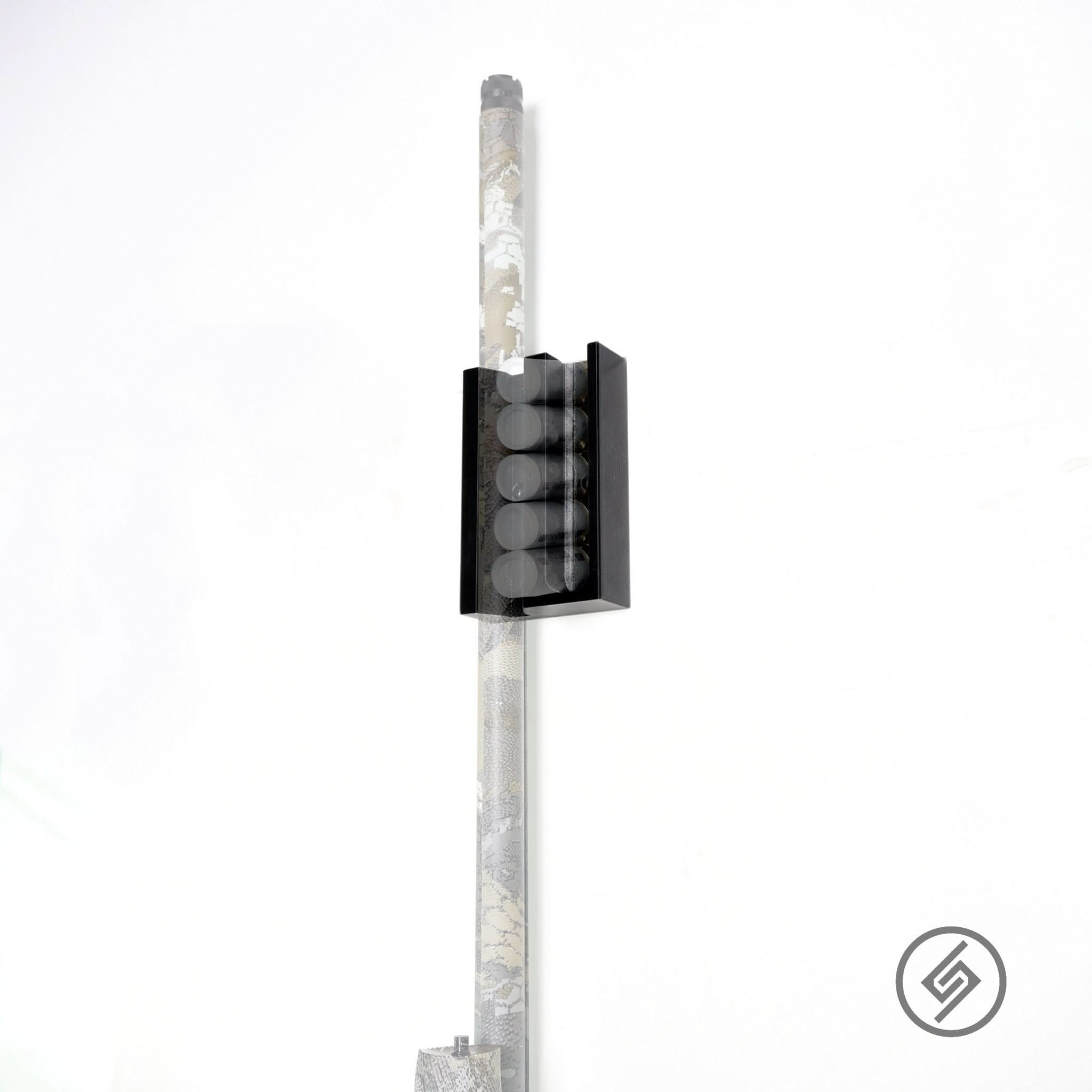 Shotgun shown secured in the Spartan Mounts magnetic storage stand for stable, upright display