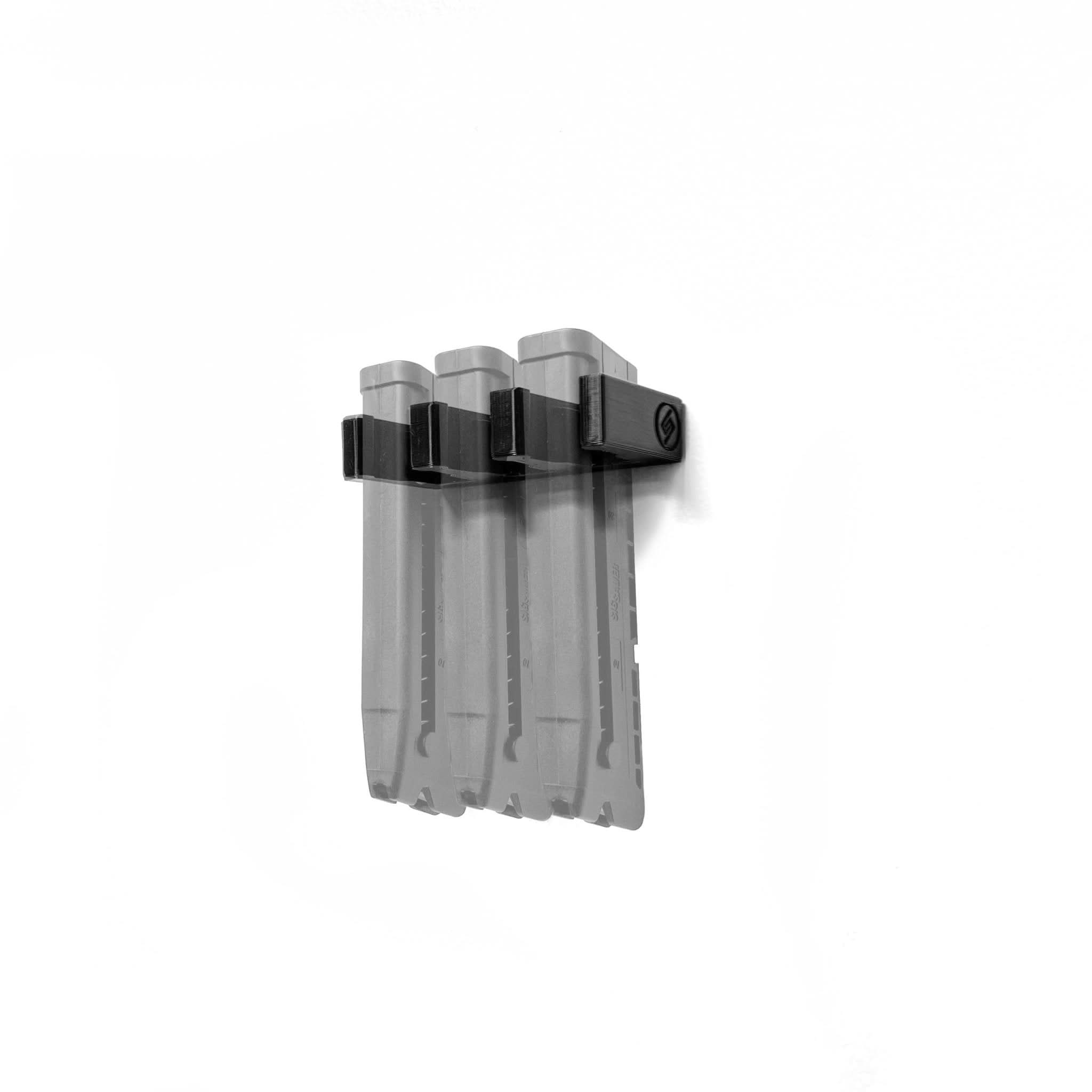 SIG P322 magazines shown loaded in the Spartan Mounts wall rack for organized, off-the-floor storage