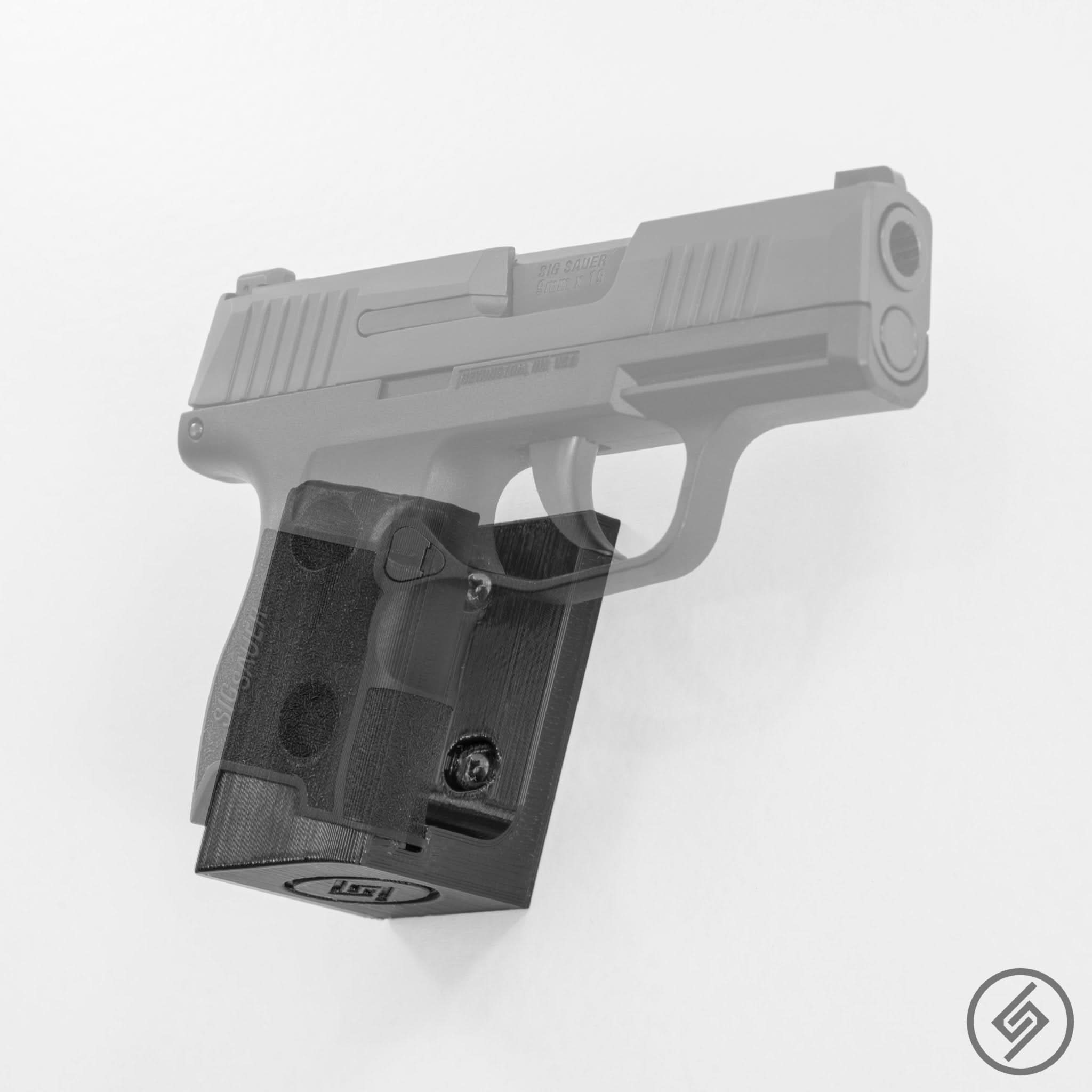 SIG P322 pistol shown mounted on the Spartan Mounts wall hook for a clean, quick-access display