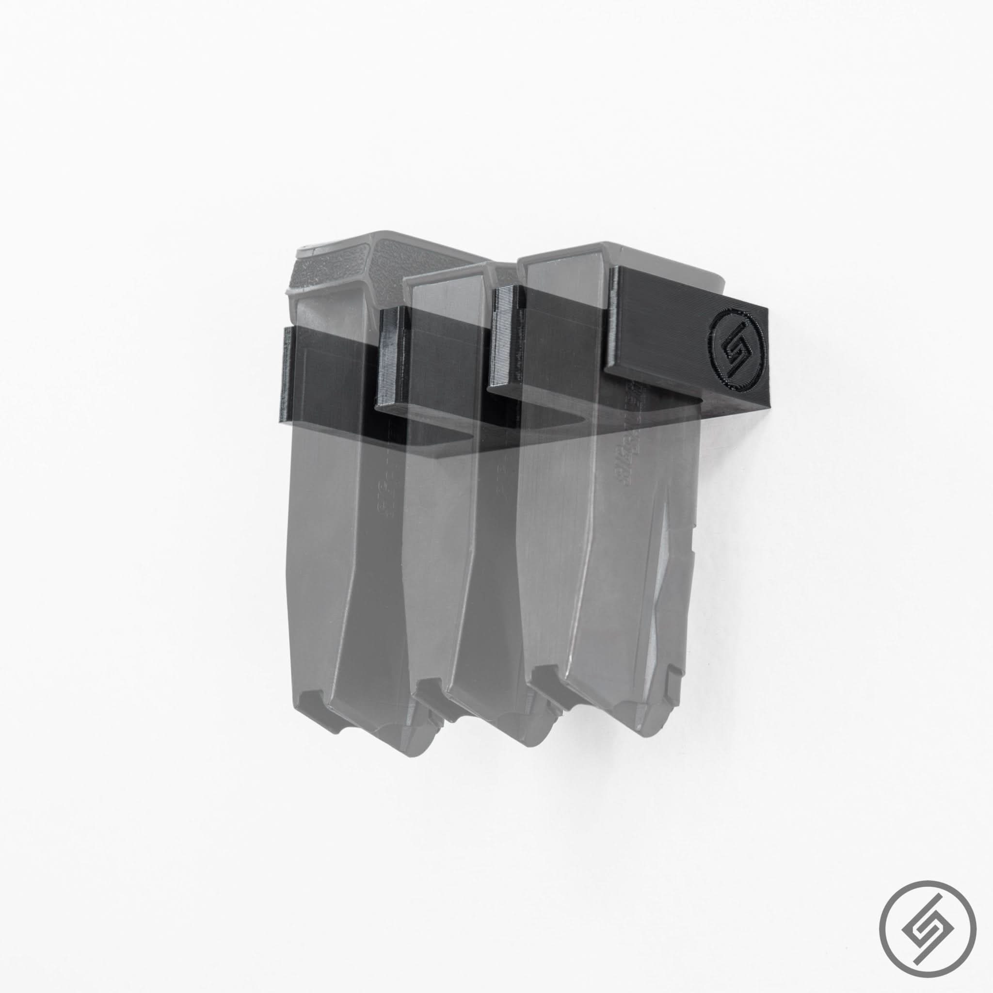 SIG P365 magazines shown loaded in the Spartan Mounts wall rack for organized, off-the-floor storage