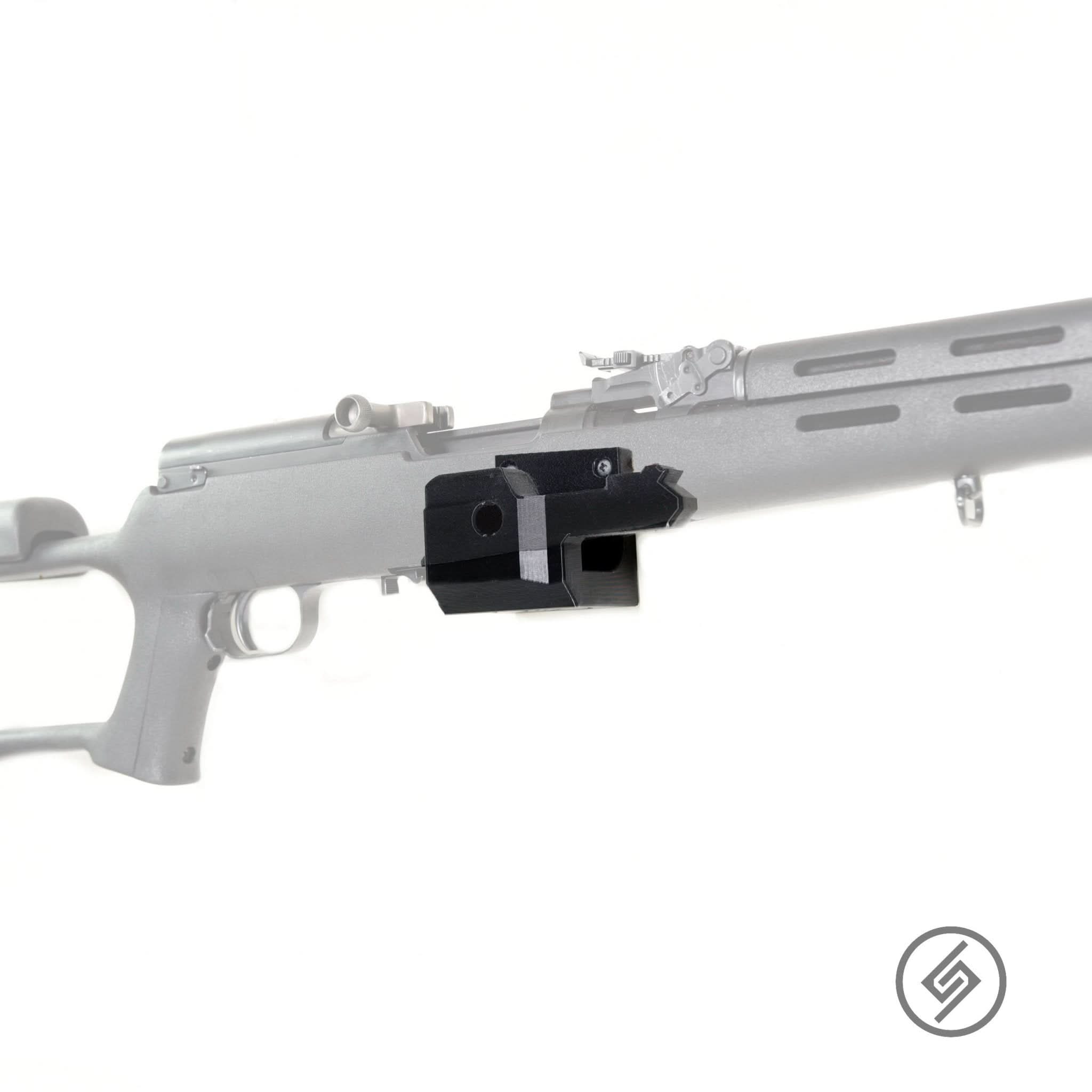 SKS rifle shown mounted on the Spartan Mounts wall hook for secure, quick-access storage