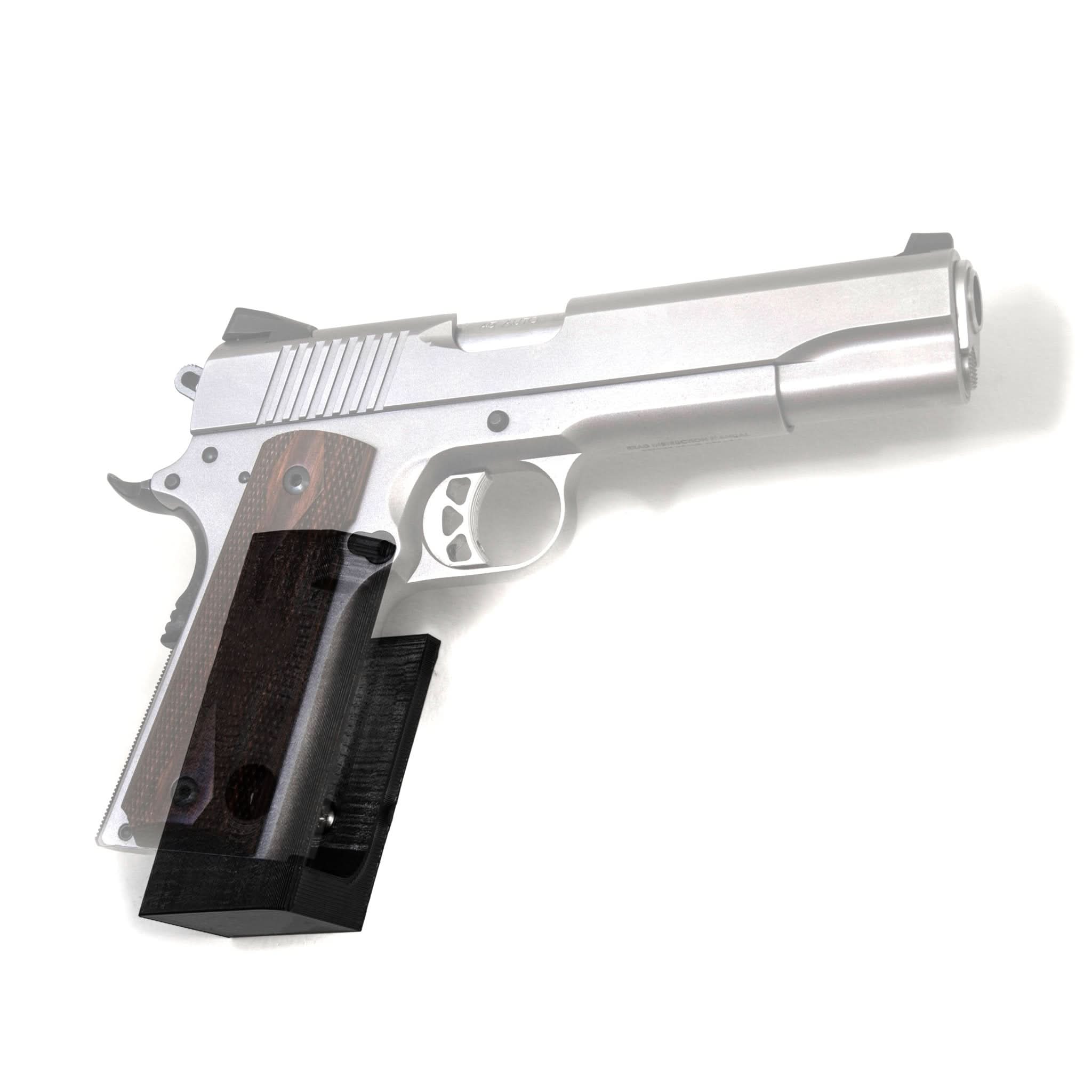 STI 2011 pistol shown mounted on the Spartan Mounts wall hook for a clean, space-saving display