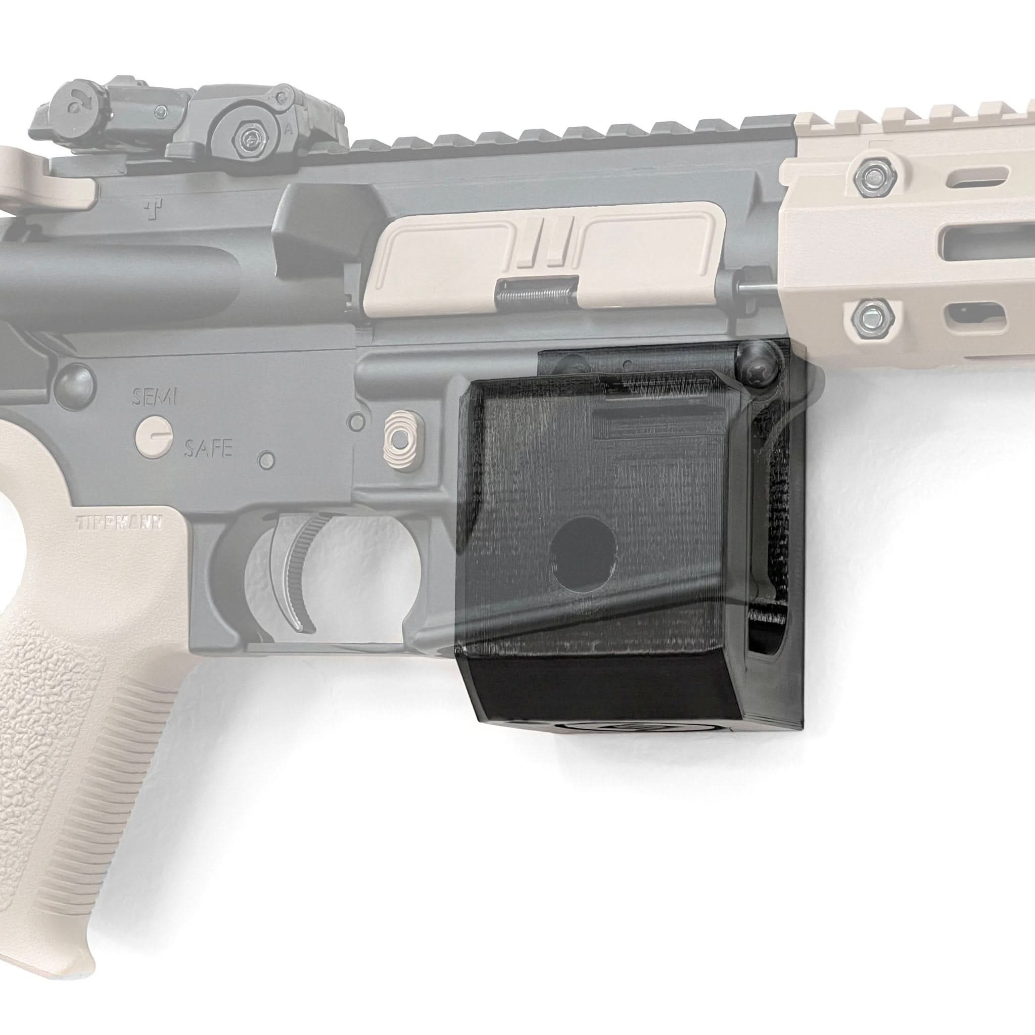 Tippmann Arms M4-22 rifle shown mounted on the Spartan Mounts wall hook for secure, quick-access storage