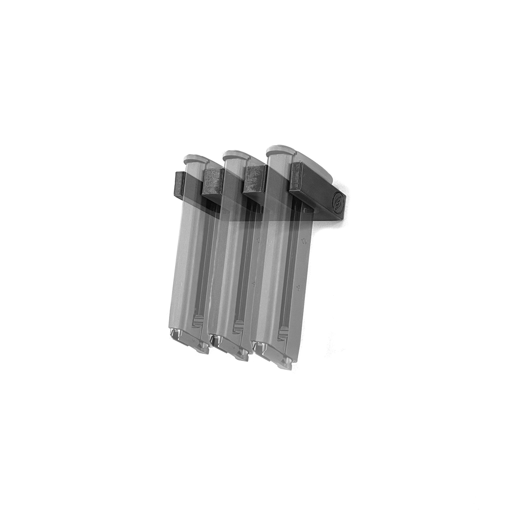 Walther WMP magazines shown loaded in the Spartan Mounts wall rack for organized, off-the-floor storage