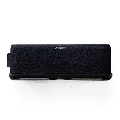 Anker Soundcore Boost speaker shown mounted on the Spartan Mounts wall mount for a clean, space-saving setup
