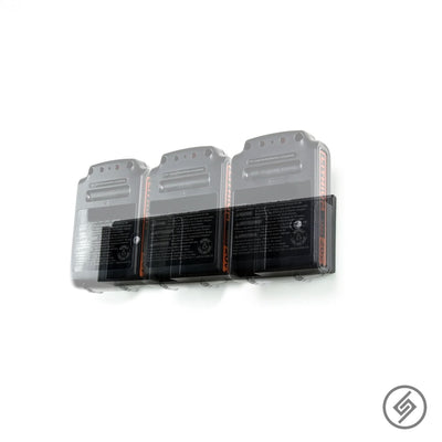 Black & Decker 20V battery shown mounted on the Spartan Mounts wall hook for organized garage and shop storage