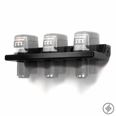 Bosch 12V battery shown mounted on the Spartan Mounts wall hook for organized garage and shop storage