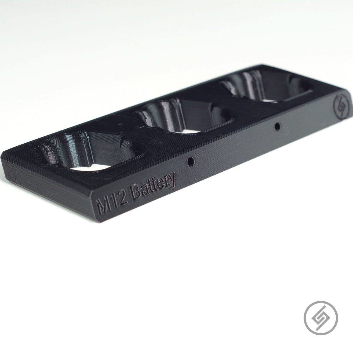 Milwaukee M12 Battery Mount by Spartan Mounts img - 5 - Mounting and Storage Solution