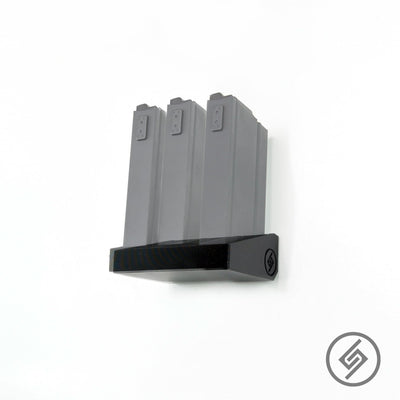 Springfield M14/M1A magazines shown loaded in the Spartan Mounts metal wall rack for organized, off-the-floor storage